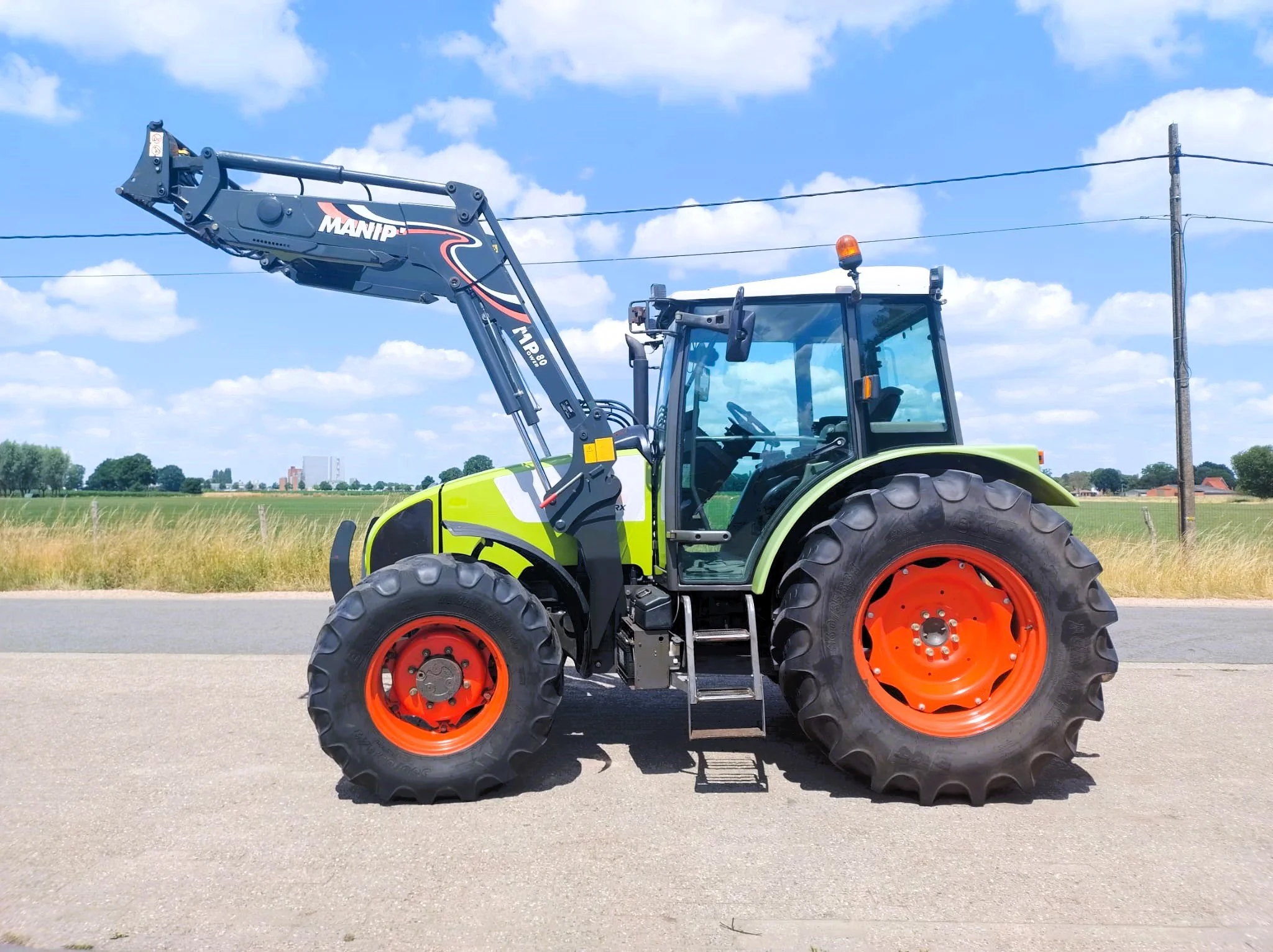 Claas Celtis 446RX met voorlader