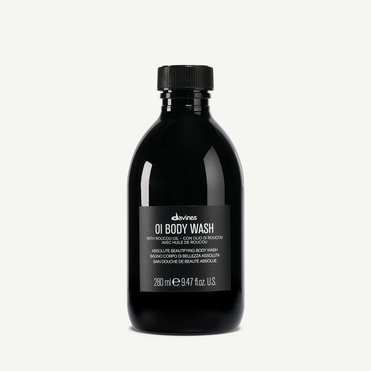 Black bottle of Davines OI Body Wash with a black label, white text, and black lid, on a white background.