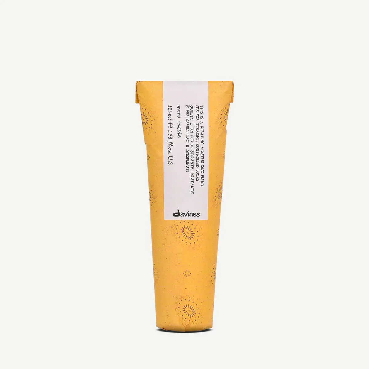 A yellow tube of Davines hair product with a white label and black text, standing upright against a plain light background.