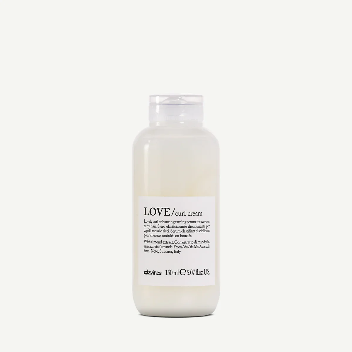A white plastic bottle of Davines LOVE curl cream with a clear flip-top cap, featuring a white label with black text detailing the product.