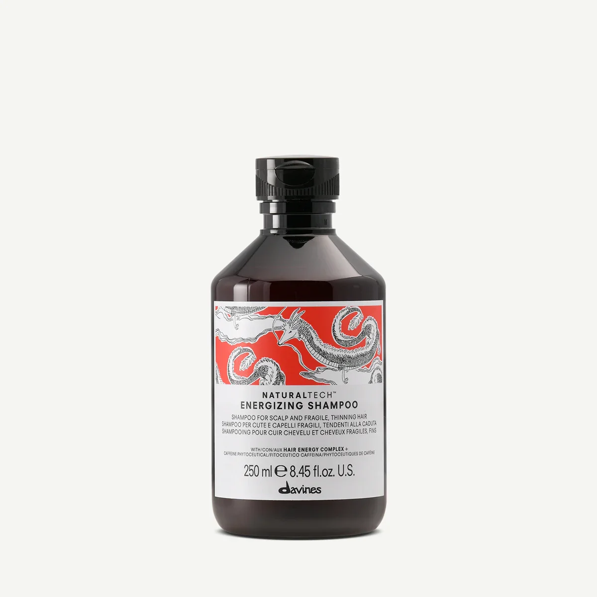 Black bottle of Davines Naturaltech Energizing Shampoo with dragon illustration on the label.