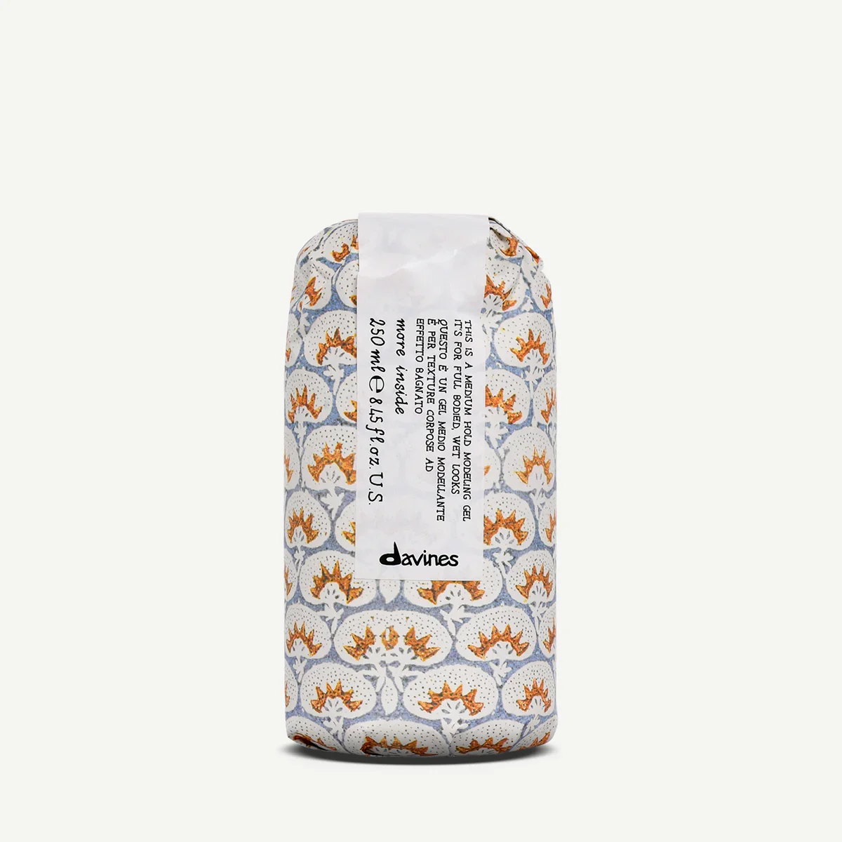 A package of Davines medium hair gel in patterned wrapping with a white label.