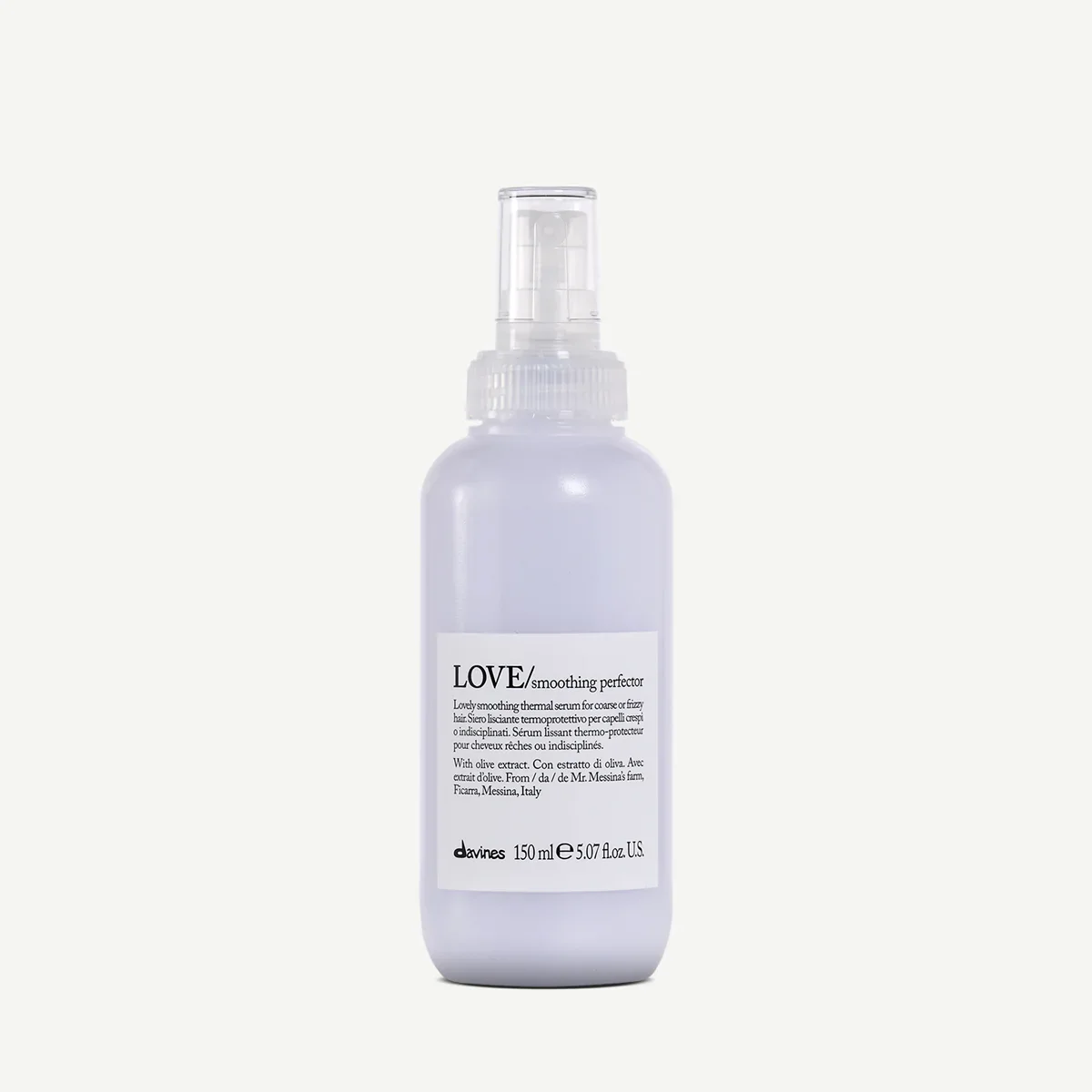 A white spray bottle labeled LOVE smoothing perfector by Davines, containing 150 ml or 5.07 fl oz. of a thermal serum for coarse or frizzy hair, with olive extract, produced in Italy.