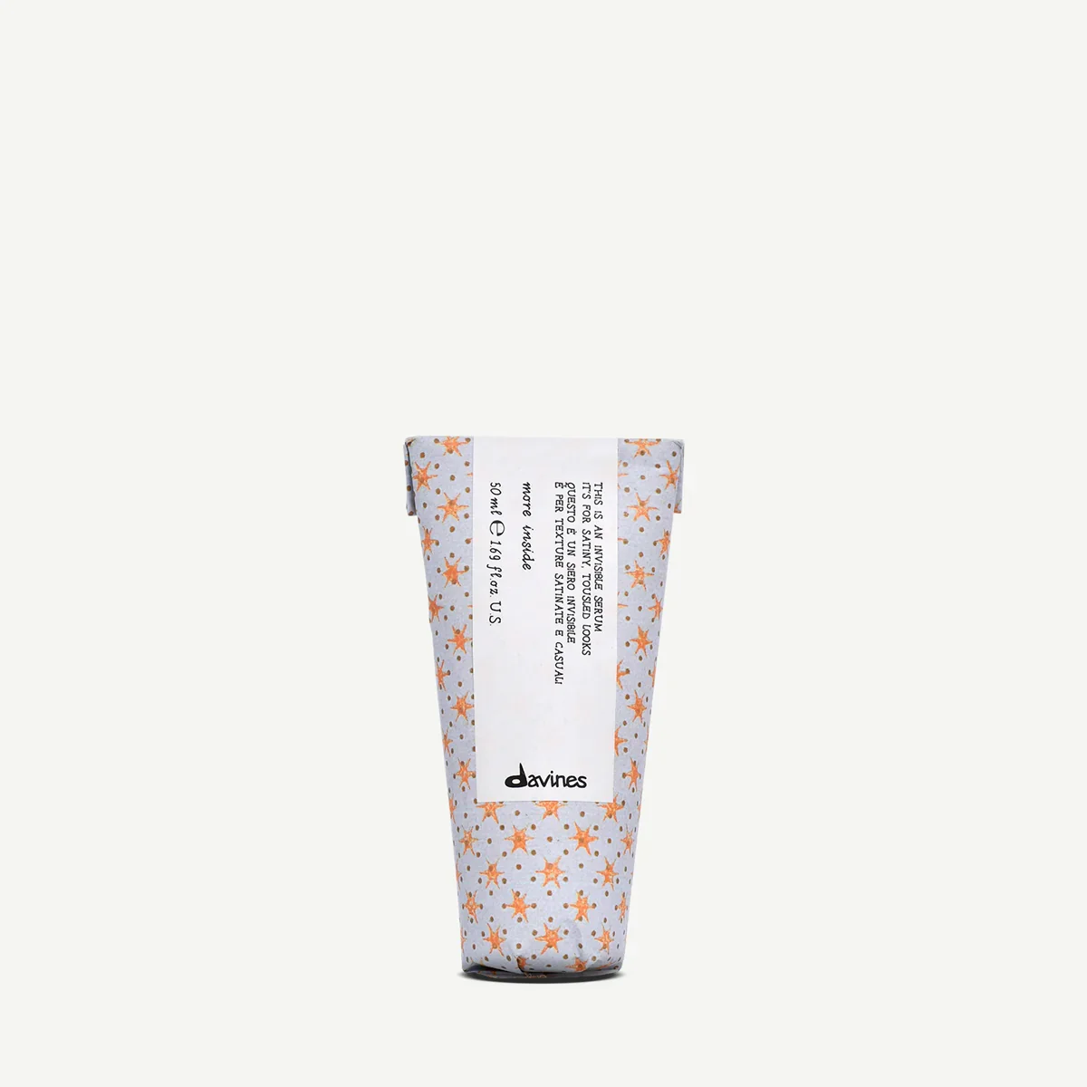 A seashells patterned wrapper packaging for Davines shampoo bottle
