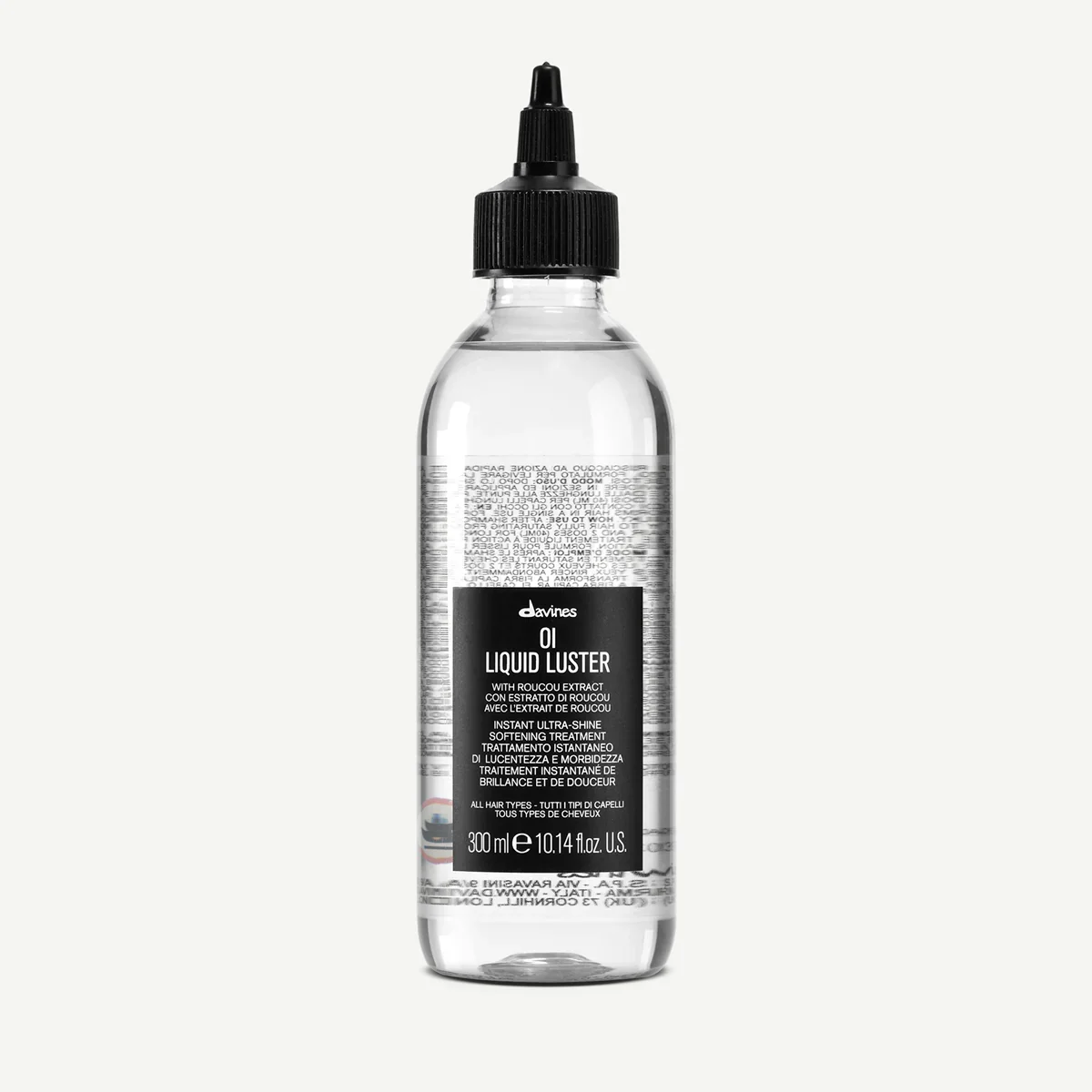 A clear plastic bottle of Davines Liquid Luster with a black cap, containing a transparent liquid, and a black label with white text.