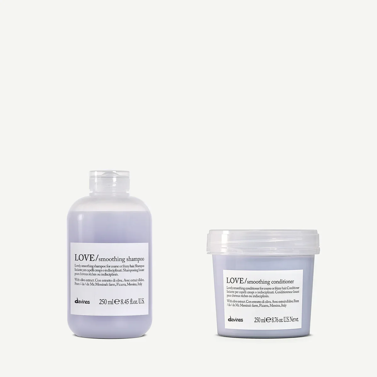 Two lavender-colored hair care products, a bottle of smoothing shampoo on the left and a container of smoothing conditioner on the right, both with white labels from Davines.