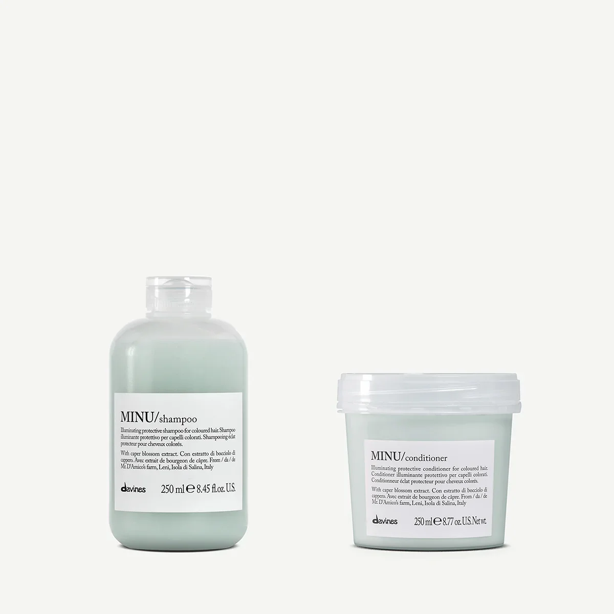 Two hair care products: a 250 ml bottle of MINU shampoo and a 250 ml container of MINU conditioner from Davines, with a minimalist design and white background.