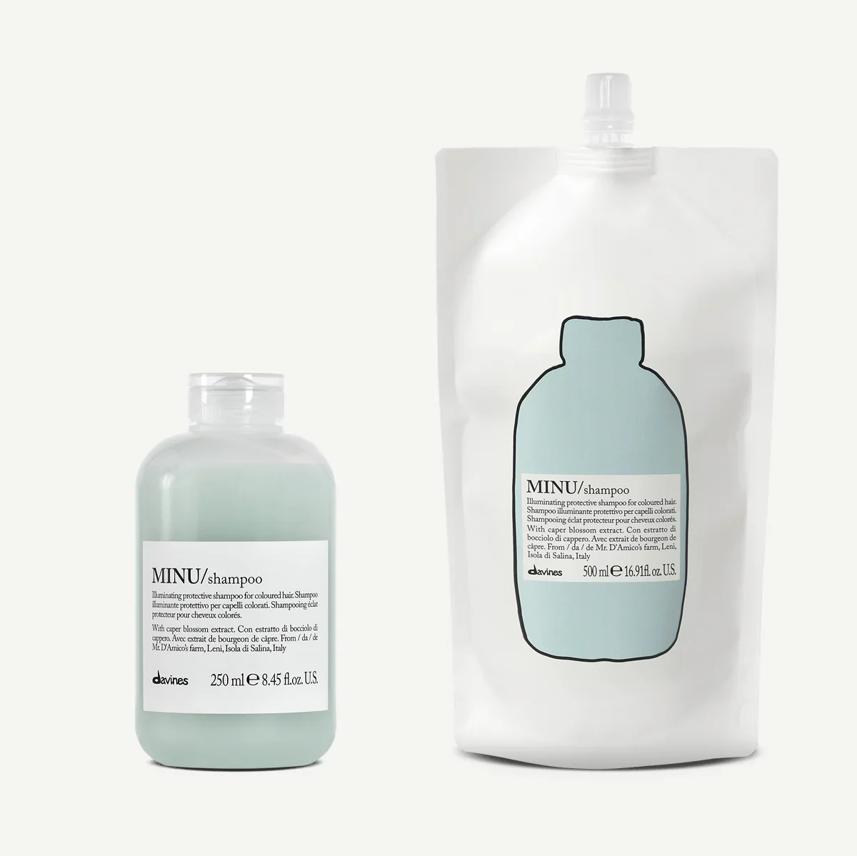 Two bottles of MINU shampoo, one smaller and one larger, with minimalist labels, light teal liquid inside, against a plain background.