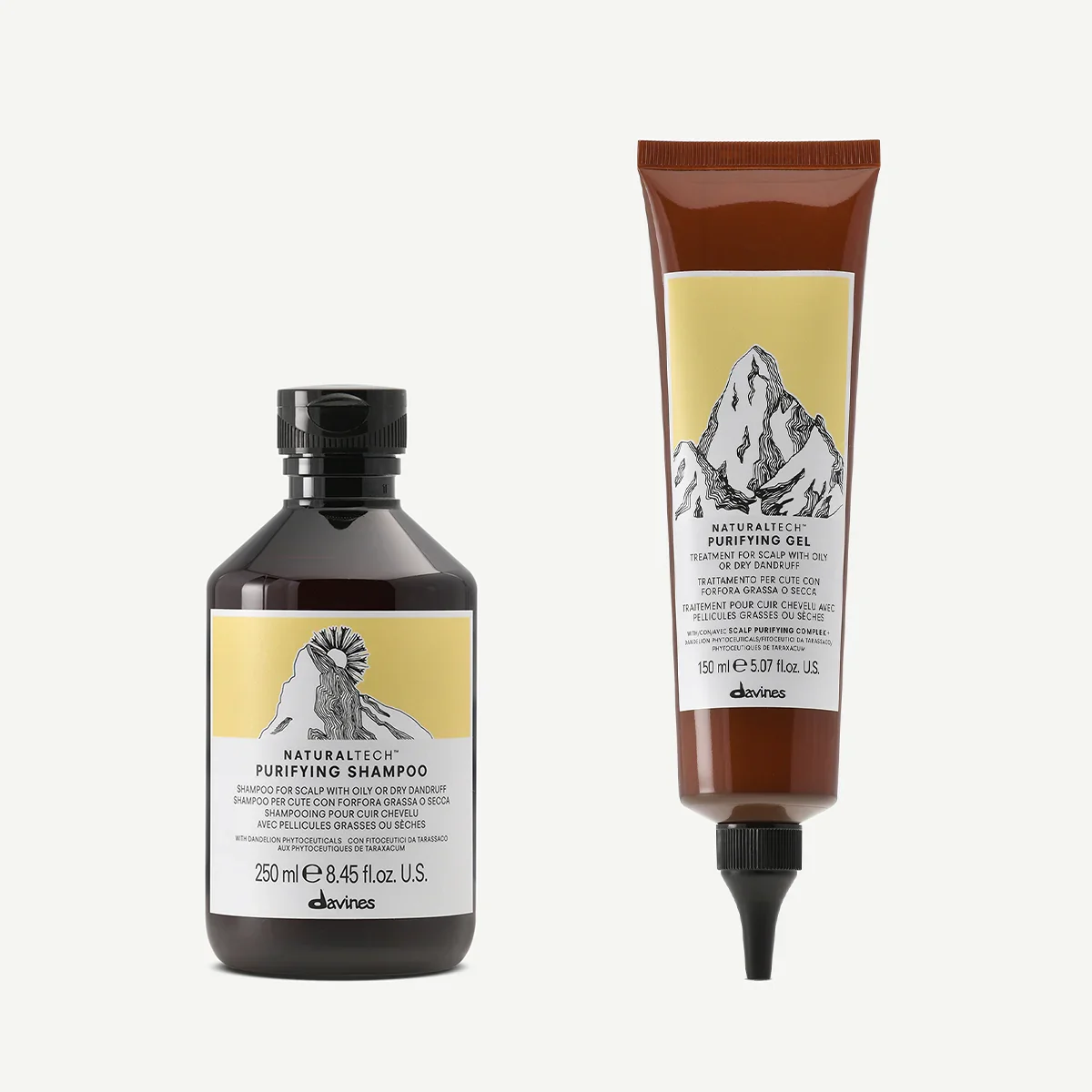 Two hair care products from Davines, a purifying shampoo in a dark bottle with a pump and a purifying gel in a squeeze tube, both featuring mountain illustrations on their labels.