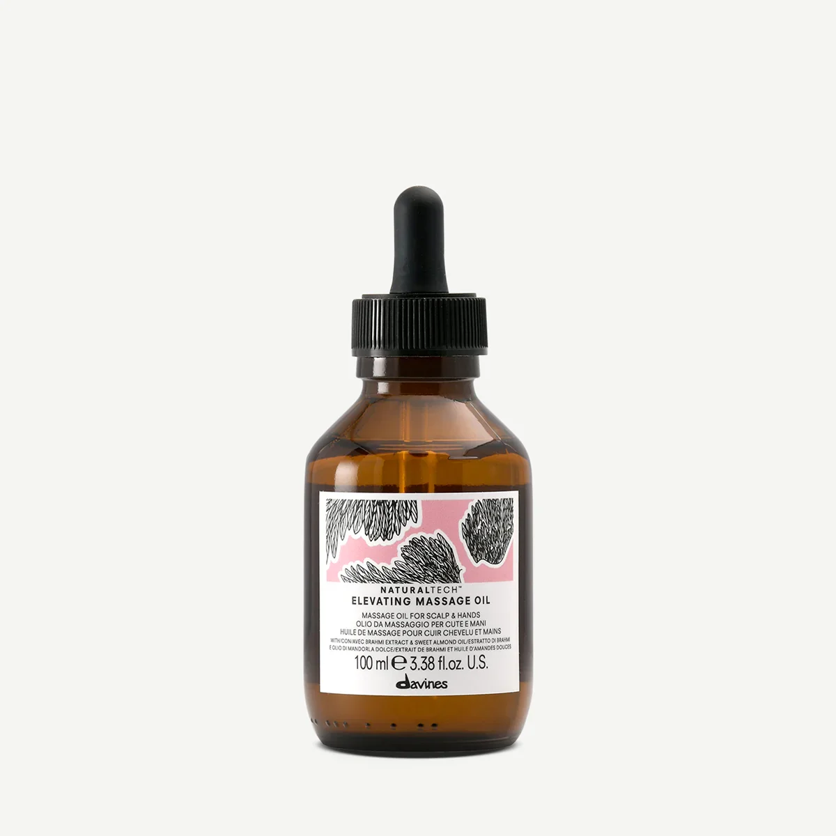 A brown glass bottle with a black dropper cap containing nourishing massage oil from Davines, labeled 'Elevating Massage Oil' with black botanical illustrations and a pink background on the label.