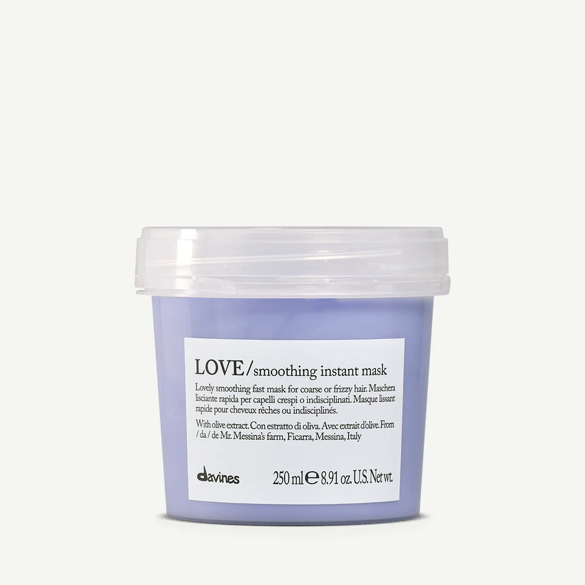 A purple container of Davines LOVE smoothing instant mask with a clear lid and white label.