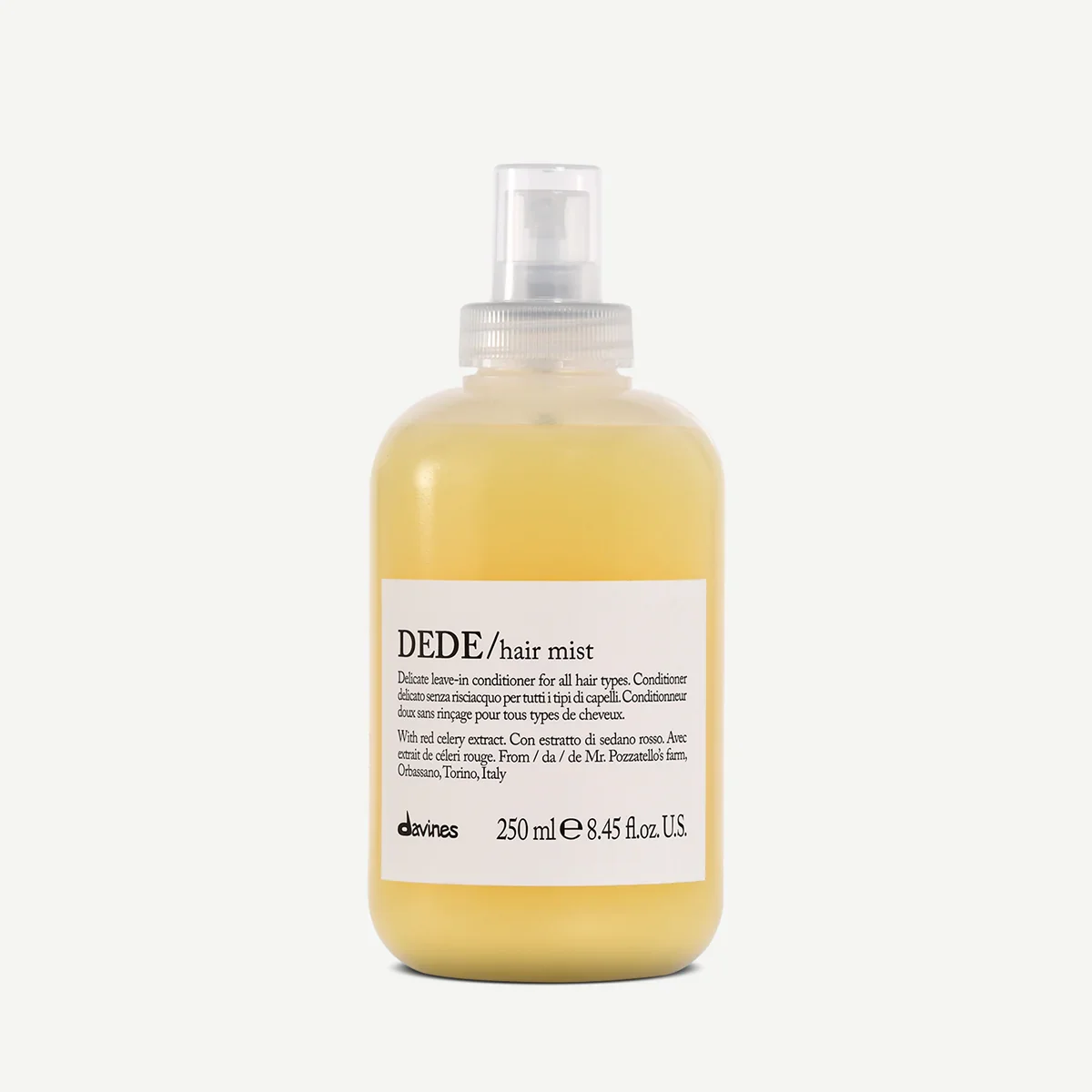 Bottle of DEDE/ hair mist by Davines, 250 ml, with label describing it as a delicate leave-in conditioner for all hair types, made with red celery extract, from Italy.