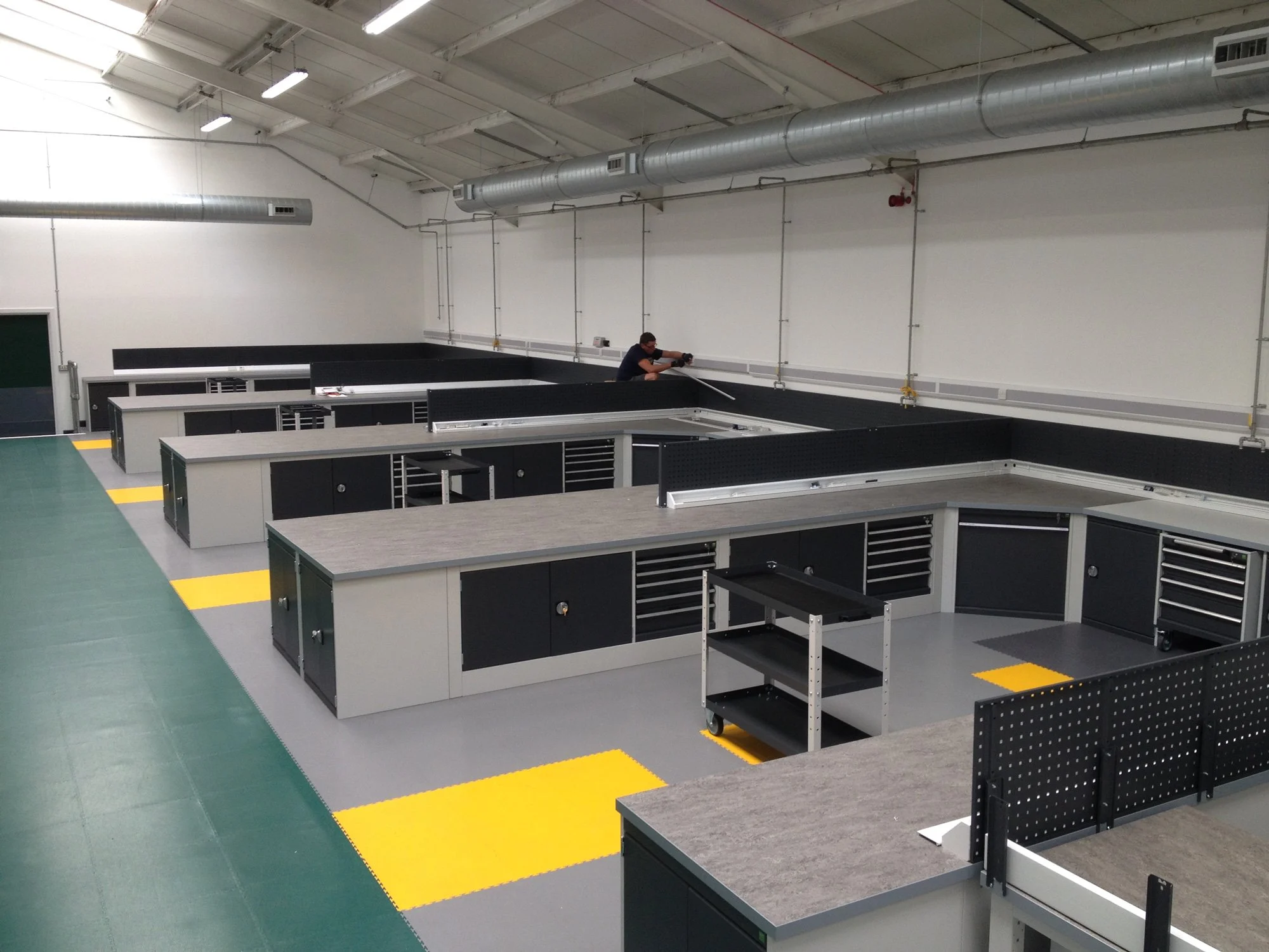 Components Custom Worktops Worktop Racking Eaton Timber Solutions modern-matte-kitchen-with-stainless-steel-worktops-on-the-large-island