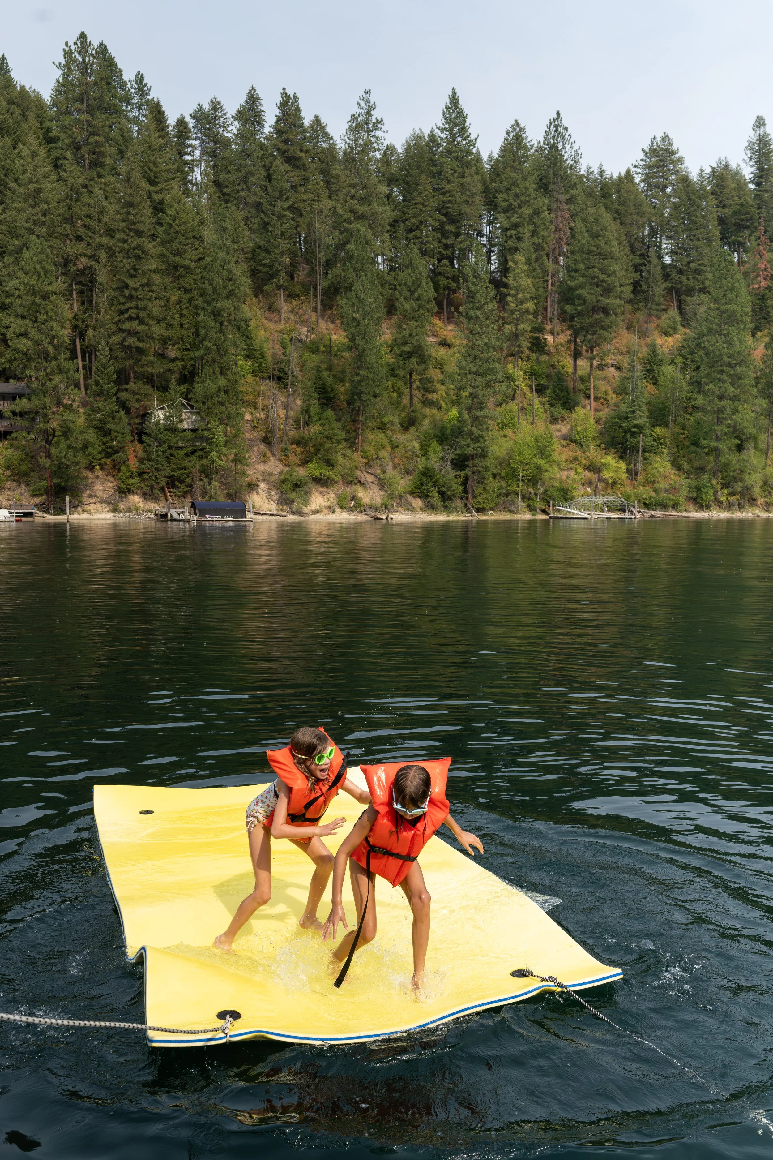 Documentary Family Photography two kids playing in lake