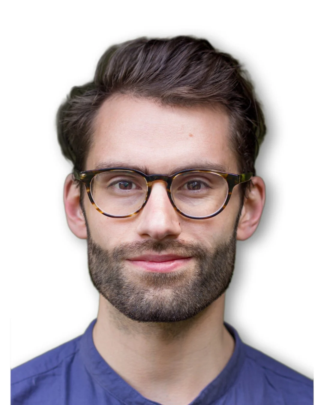 An image of Michael Fredericks, slightly smiling, wearing a blue shirt and glasses