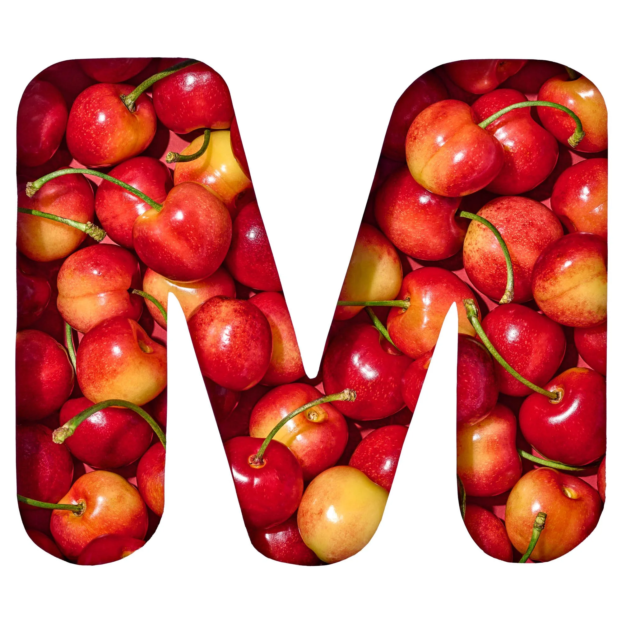 The letter M filled with pink and gold Rainier cherries, part of Suzanne Clements' produce-spelled SUMMER title card for the Publix summer campaign.