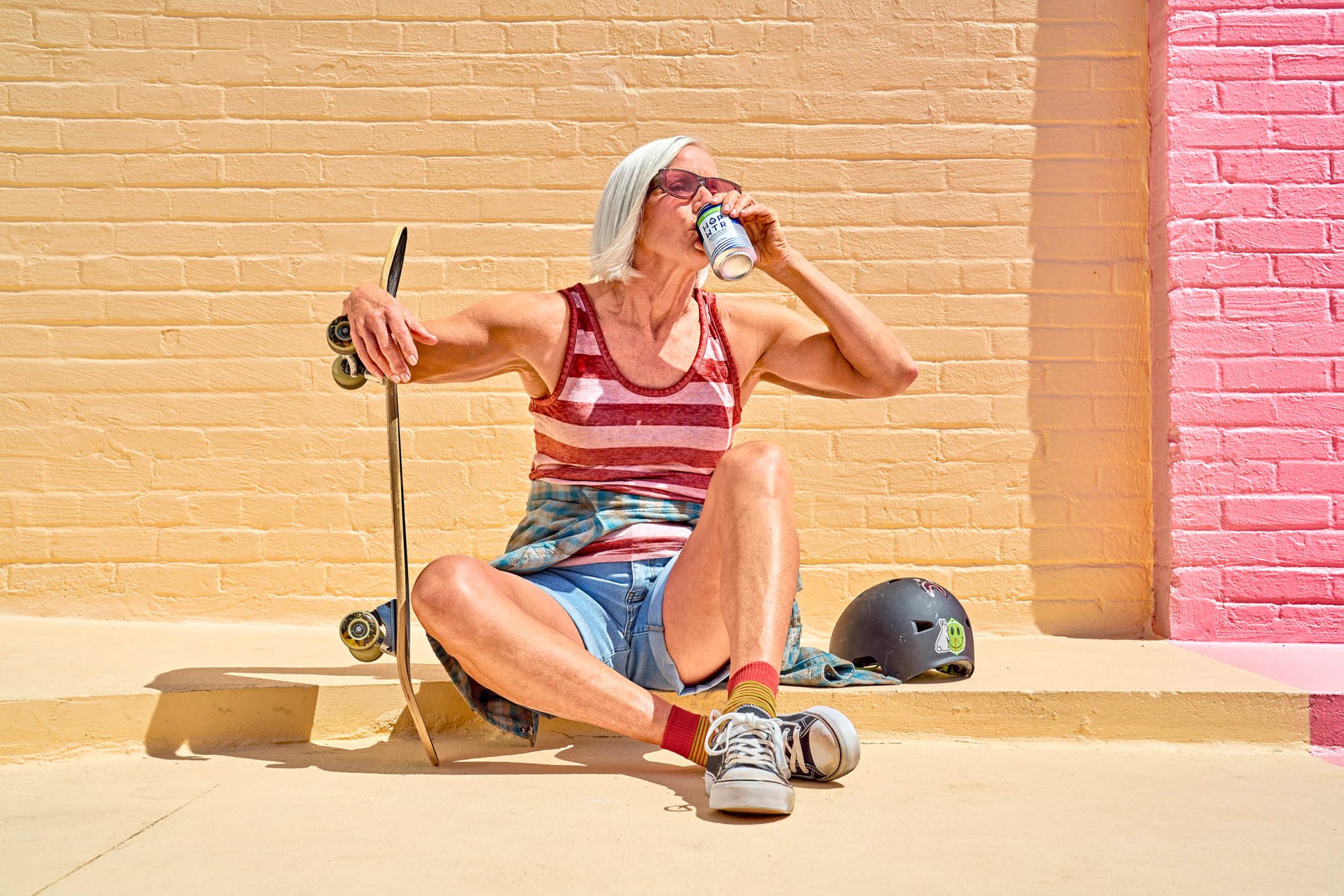Sip and smile moment for a beverage brand campaign shot on location in Central Florida