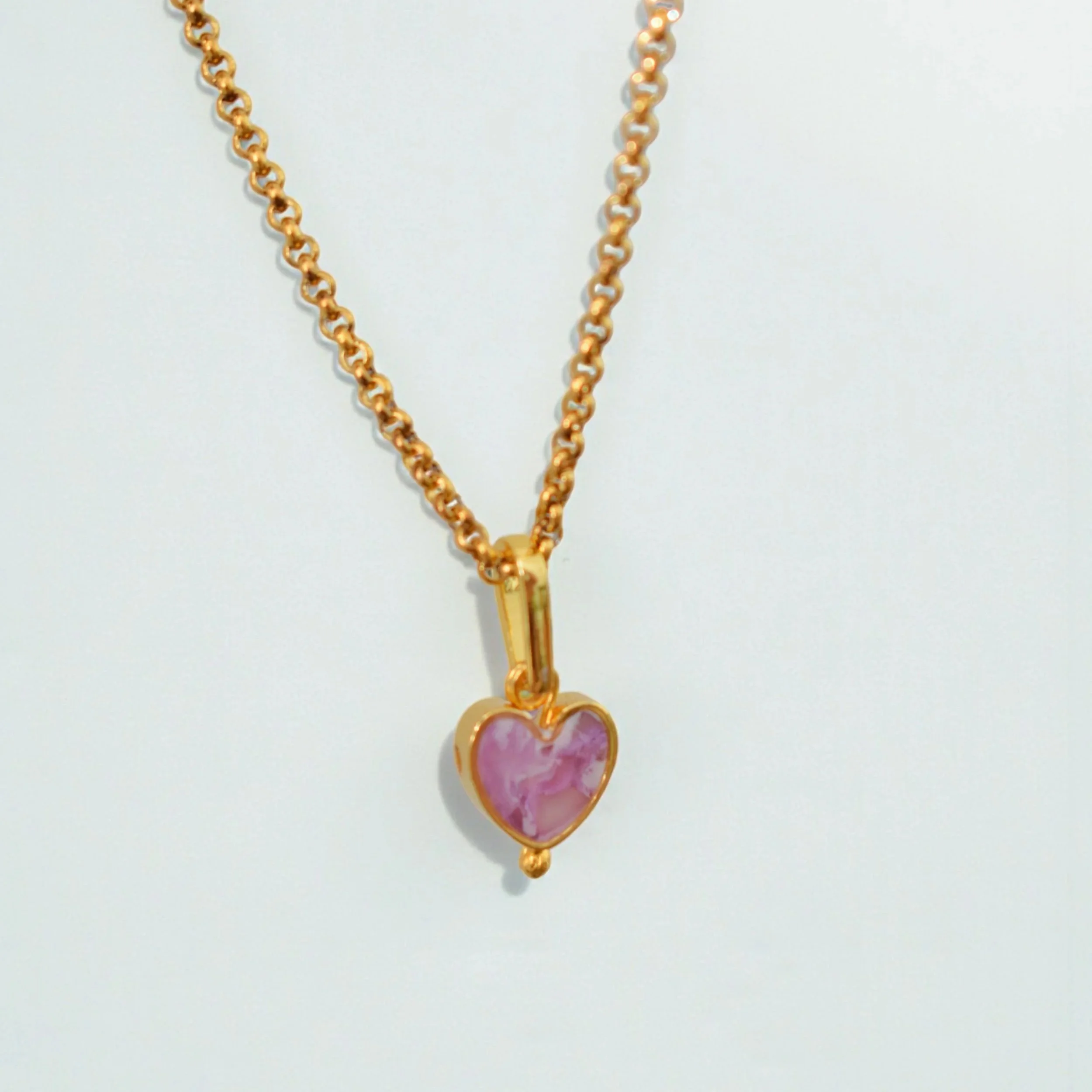 Agape_tiny_heart_gold-Photoroom.jpg