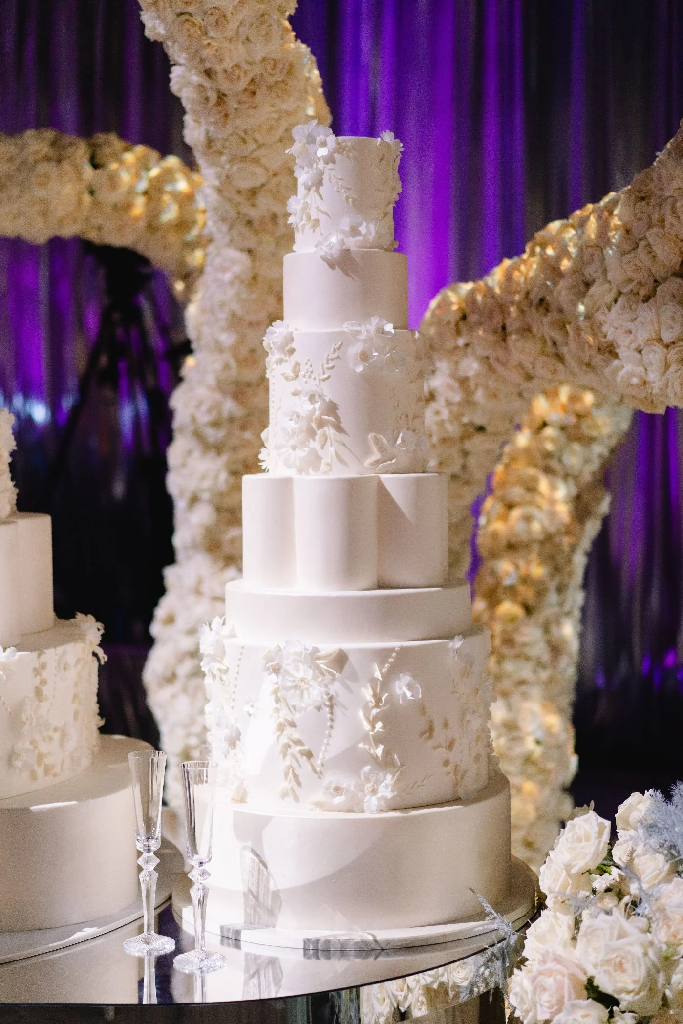 Wedding Planner and Event Design Styling a Wedding Cake Display with Floral and Decor Details