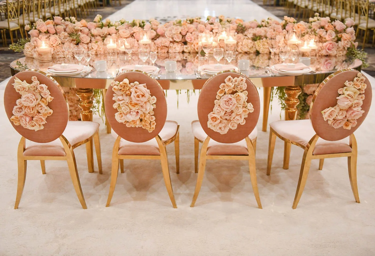 Pink Velvet Wedding Dining Chairs with Rose Chair-Back Details in a Romantic Reception Setting