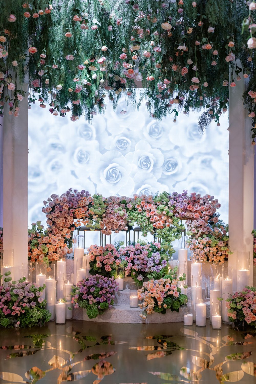 Cascading deep pink and cream roses surround gold and cream accents to create an enchanted garden at the Taglyan Cultural Complex - Eddie Zaratsian Lifestyle &amp; Design