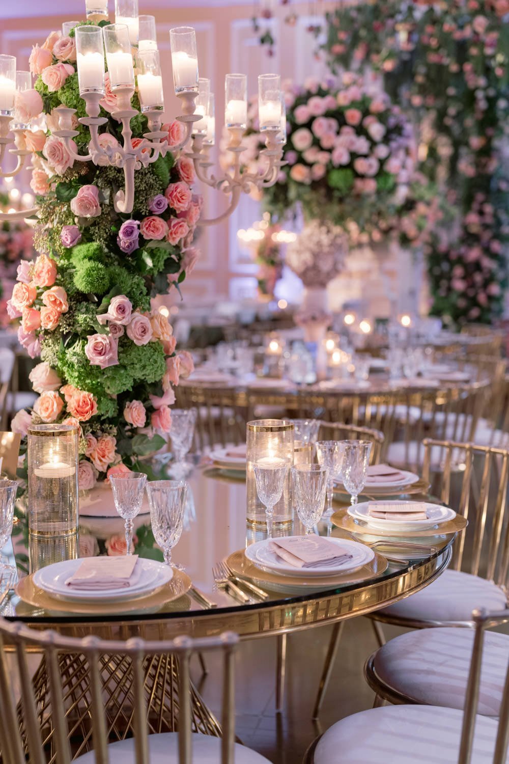 Deep pink and cream rose centerpieces with gold and cream table settings create an enchanted garden at the Taglyan Cultural Complex - Eddie Zaratsian Lifestyle &amp; Design