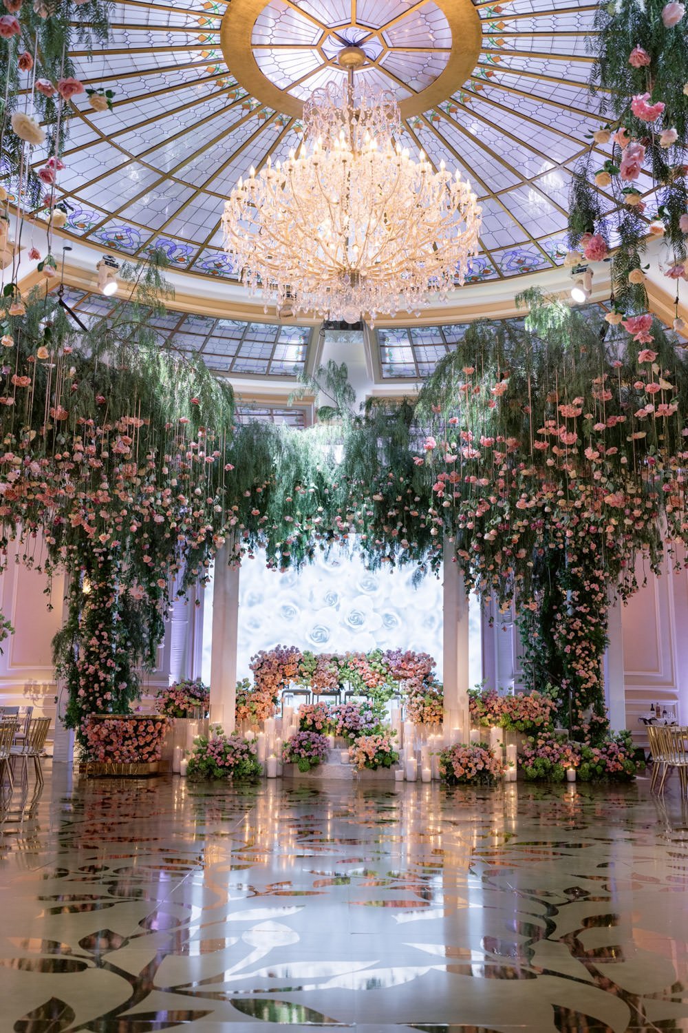 Cascading deep pink and cream roses surround gold and cream accents to create an enchanted garden at the Taglyan Cultural Complex - Eddie Zaratsian Lifestyle &amp; Design
