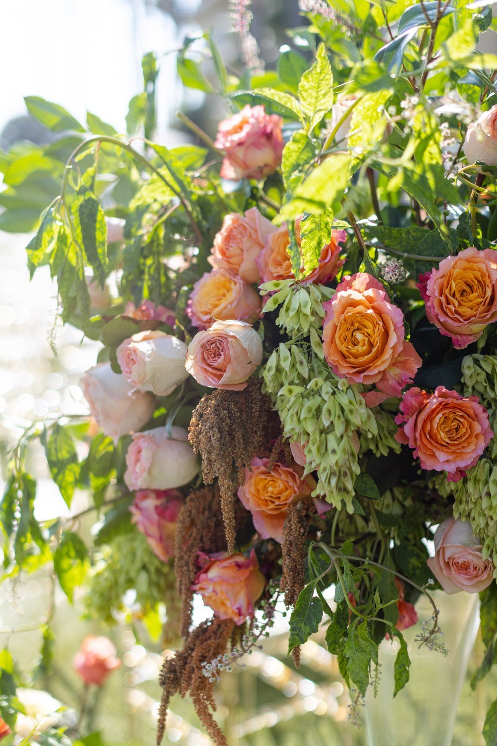 Spectacular peach, coral and roses showcase the outdoor ceremony at the Ritz-Carlton Laguna Niguel