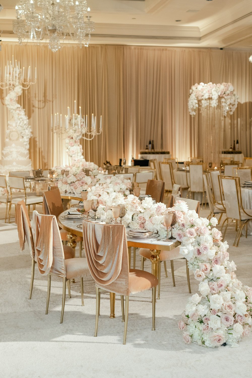 Crystal and gold accent velvet seating create a bright and bold ballroom setting at the Ritz-Carlton Laguna Niguel