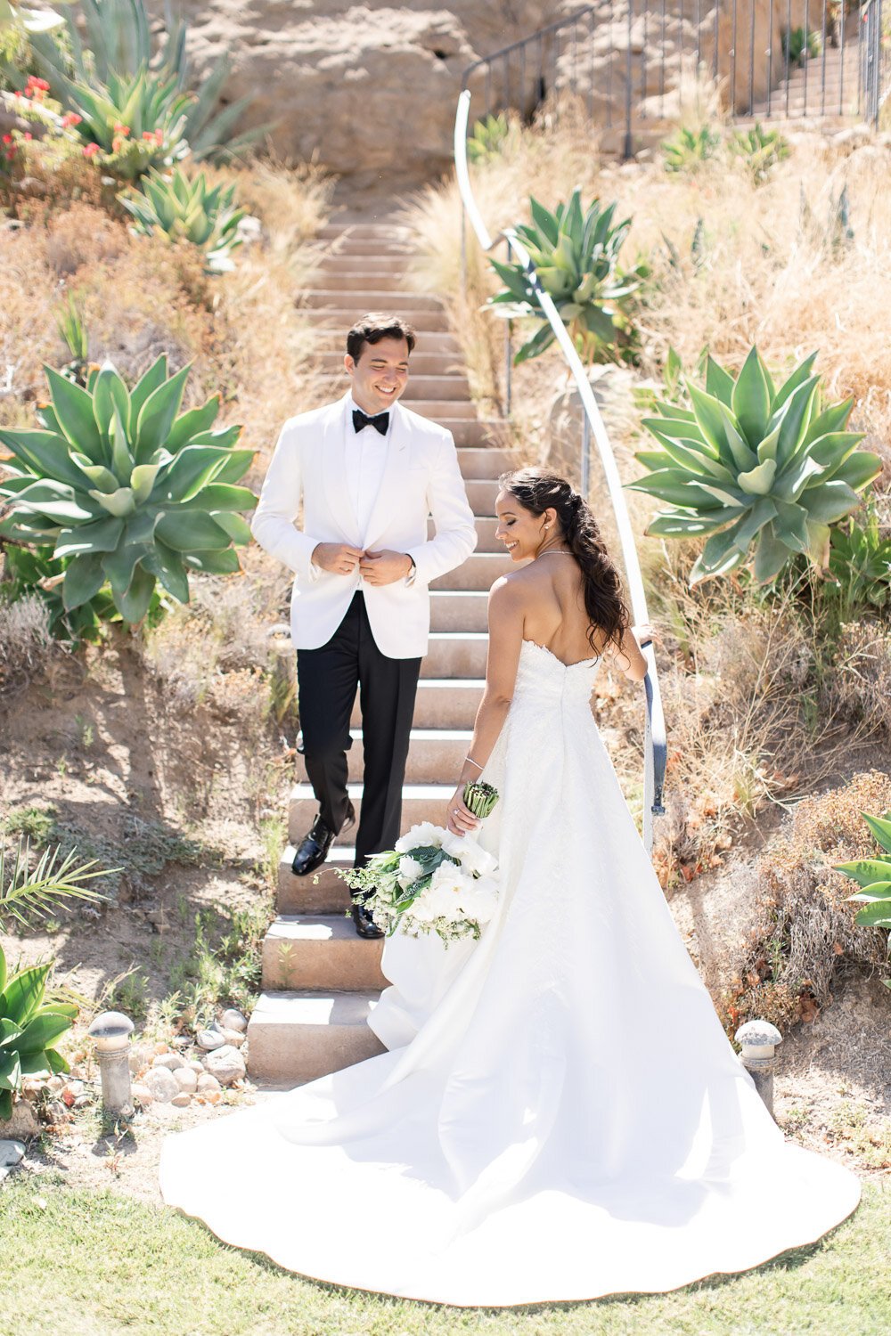 Bride and groom at Hummingbird Nest Ranch wedding, florals designed by Eddie Zaratsian Lifestyle & Design