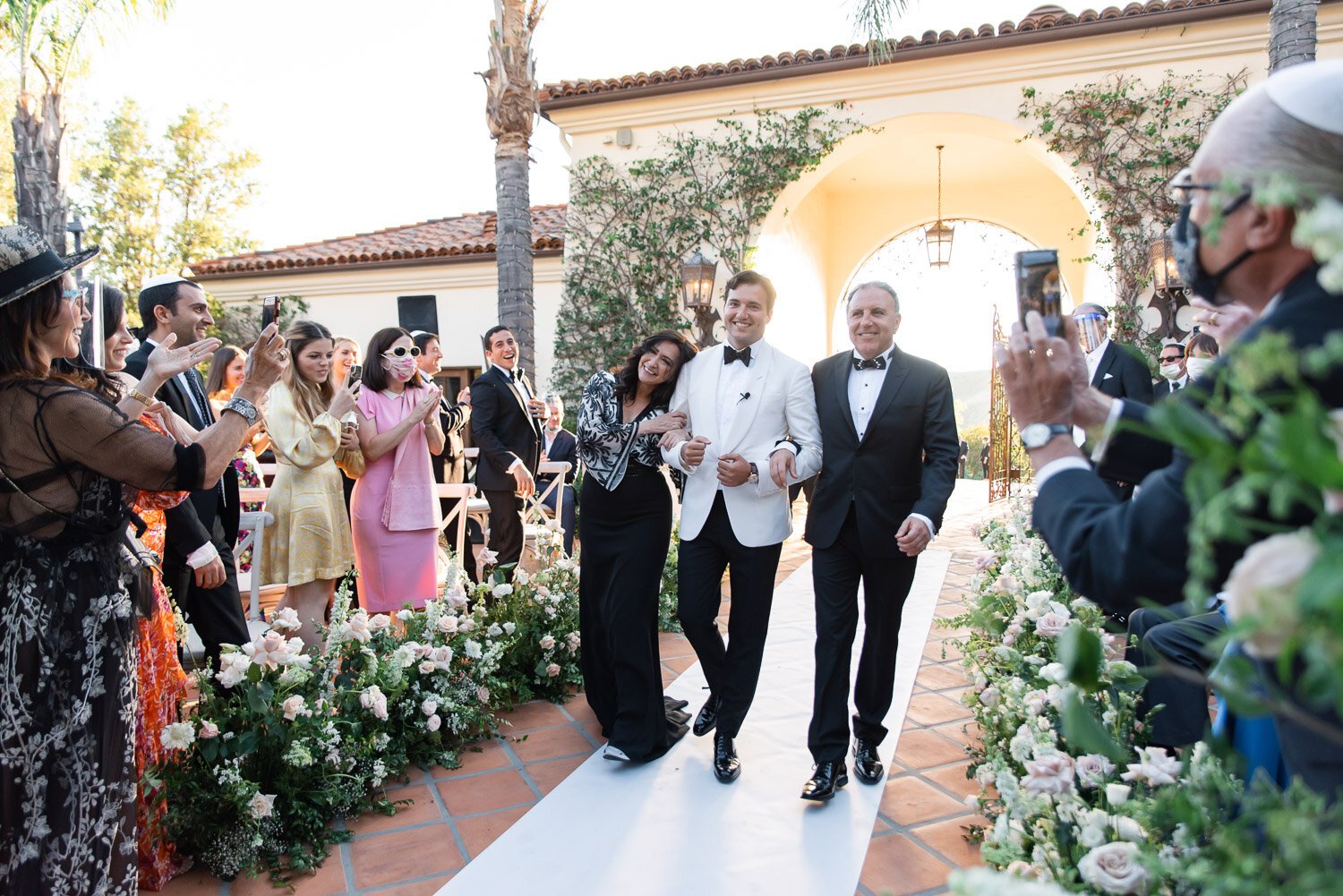 Wedding ceremony processional at Hummingbird Nest Ranch, florals designed by Eddie Zaratsian Lifestyle & Design