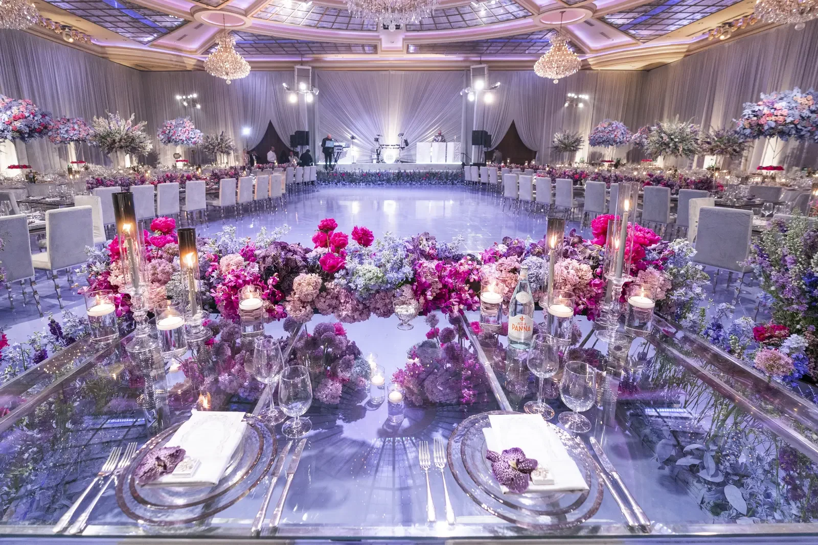 Purple wedding theme with clear tables