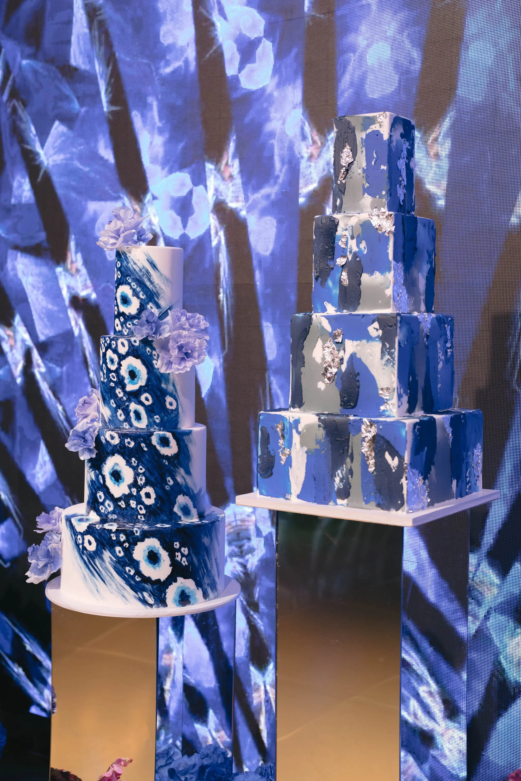 Custom Birthday Party Cake Styled by an Event Planner in Los Angeles with Blue Patterned Tiers and Elevated Presentation