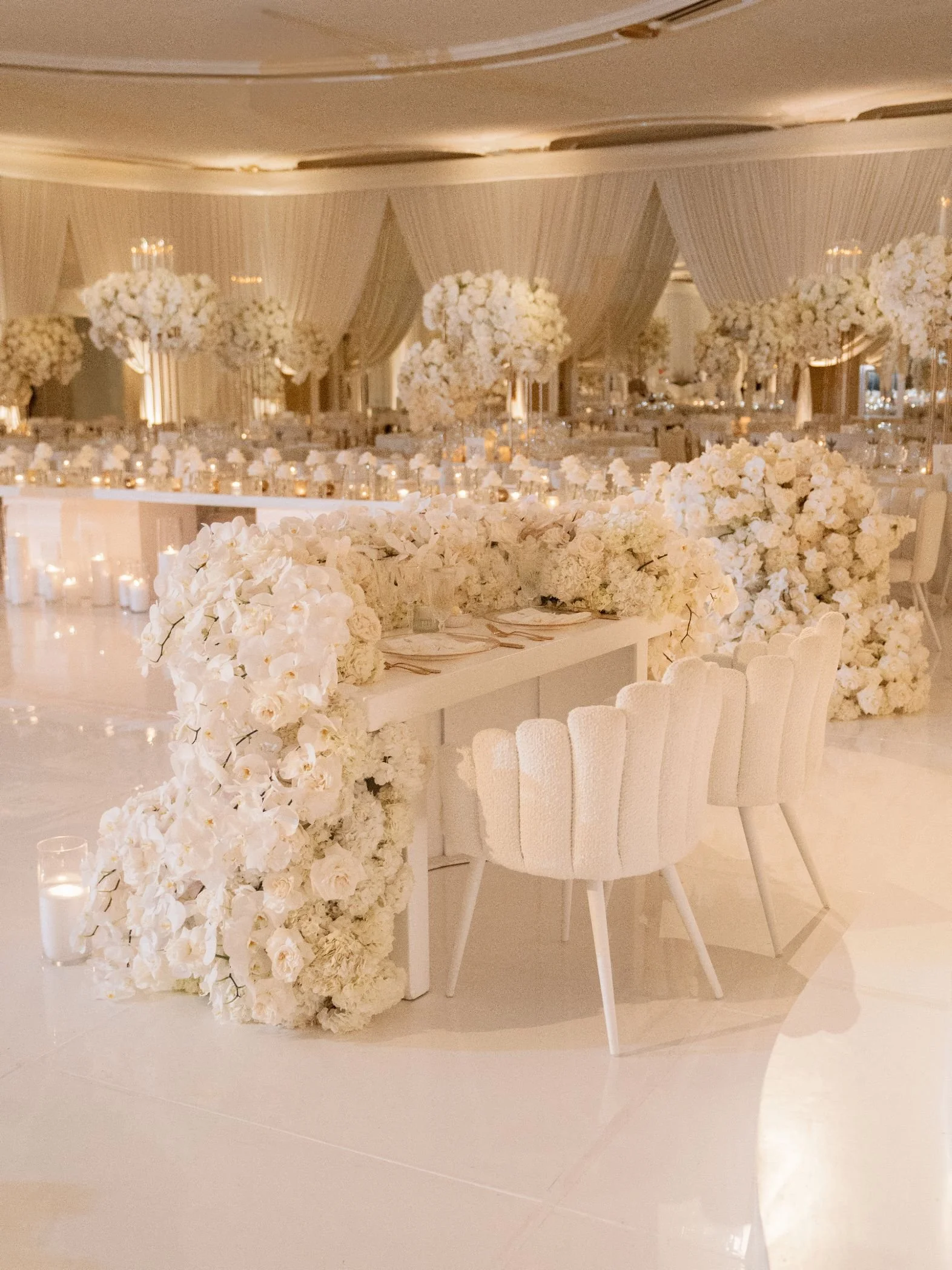 Wedding Planner Creating a Sweetheart Table with White Florals and Refined Styling at the Beverly Hills Hotel