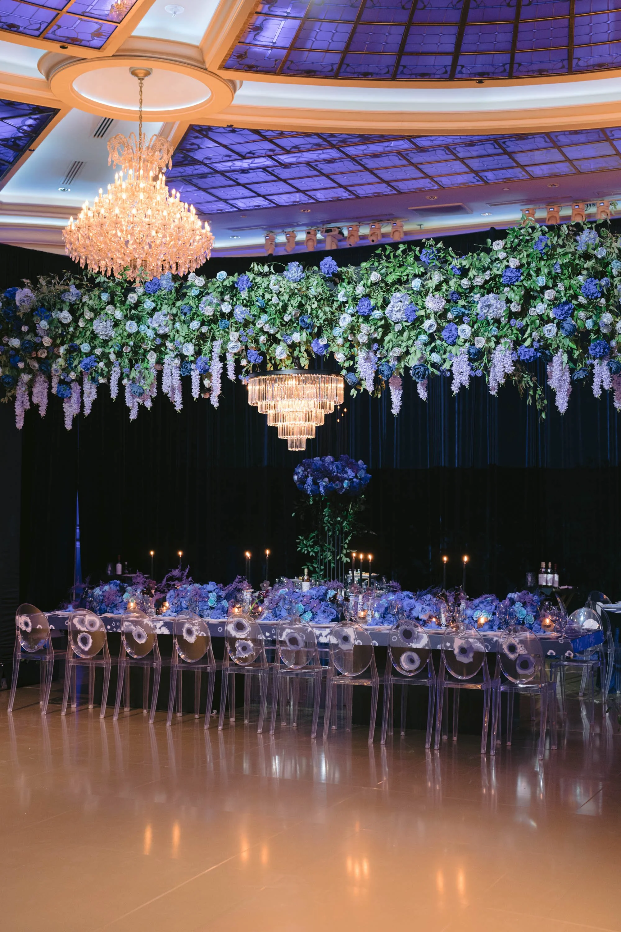 Luxury Event Planning in Los Angeles with Purple Decor and Overhead Floral Installations for a Birthday Celebration