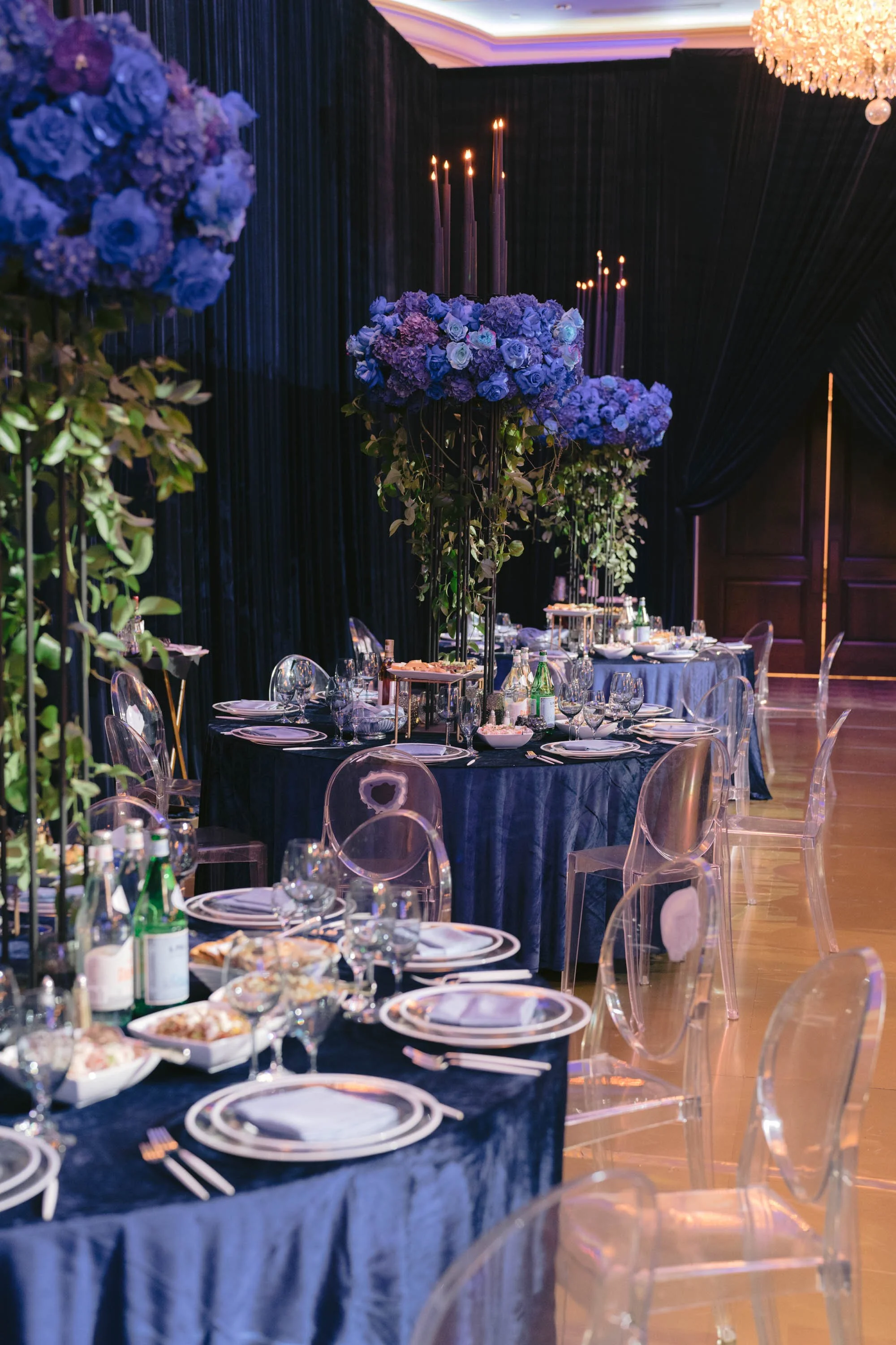Luxury Event Planning in Los Angeles with Tall Blue and Purple Centerpieces and a Styled Birthday Dinner Table