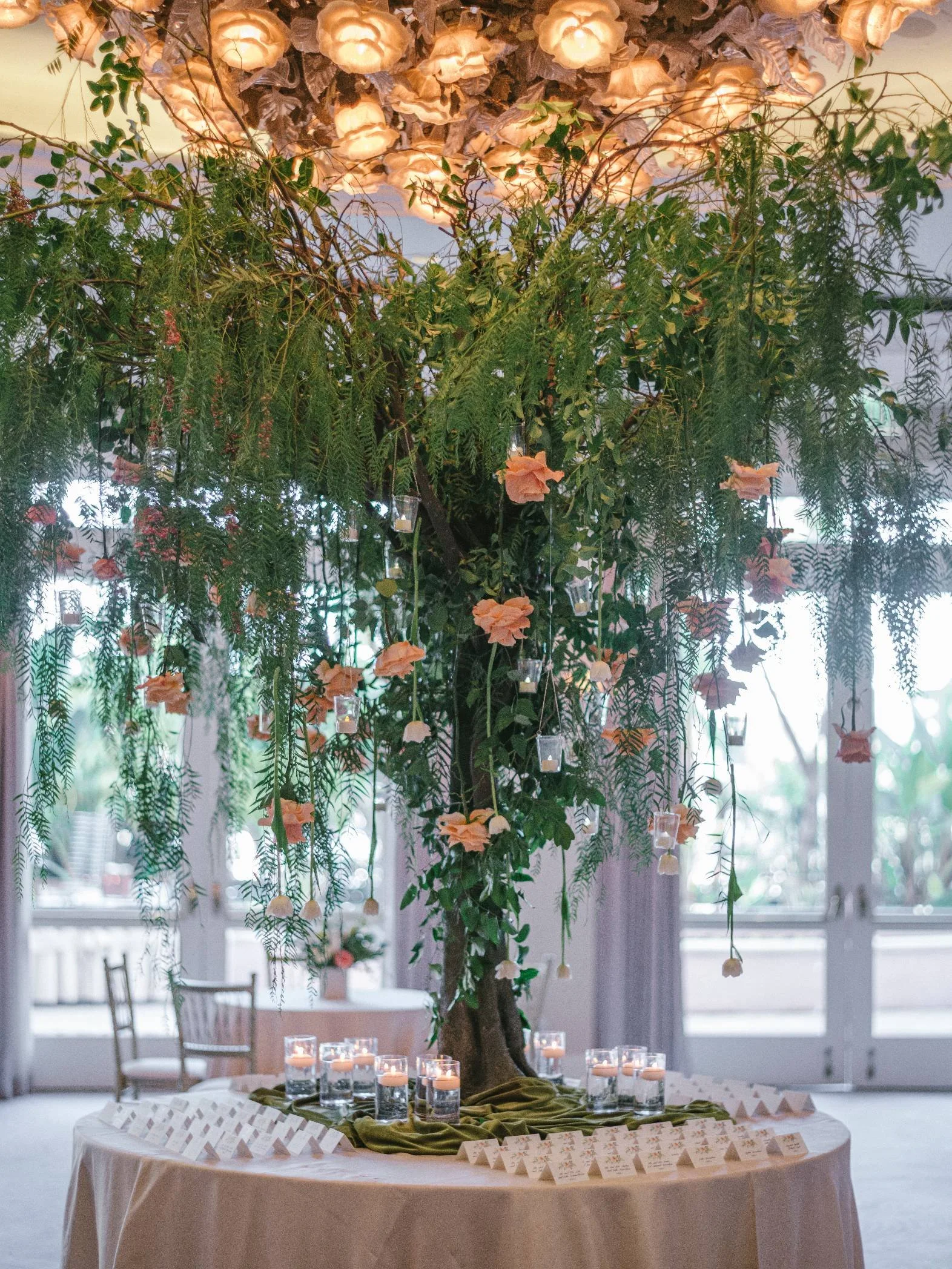 Wedding Planner Designing Sculptural Tree Centerpieces with Layered Greenery for a Spring Reception in Beverly Hills