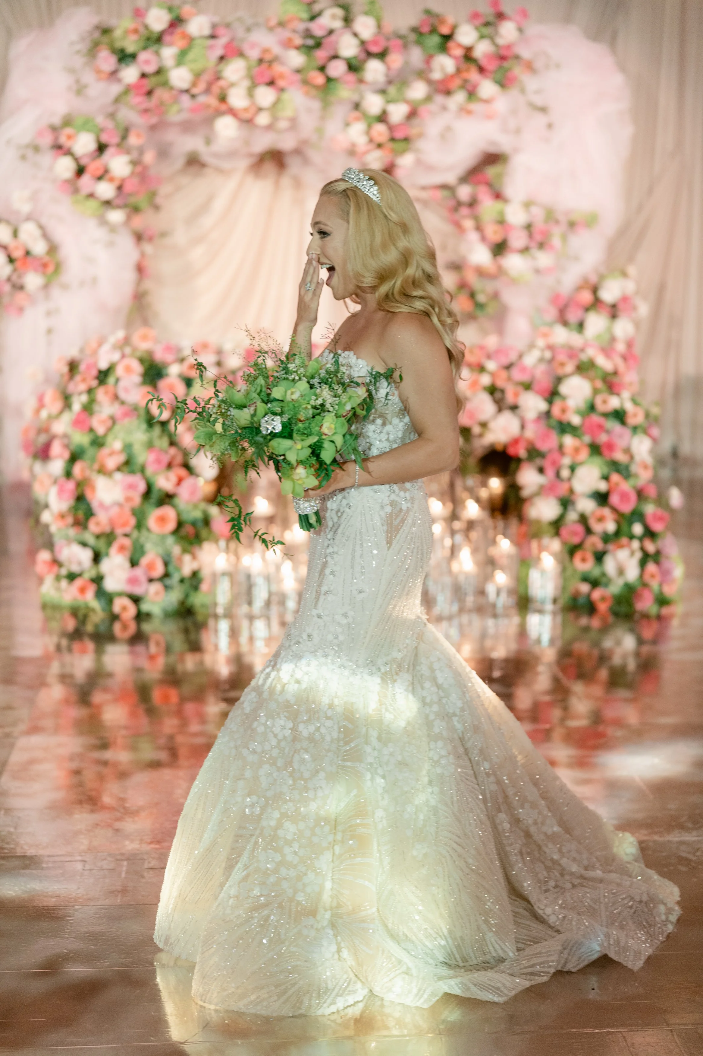 Bride and Wedding Planner Sharing a Reaction Moment 