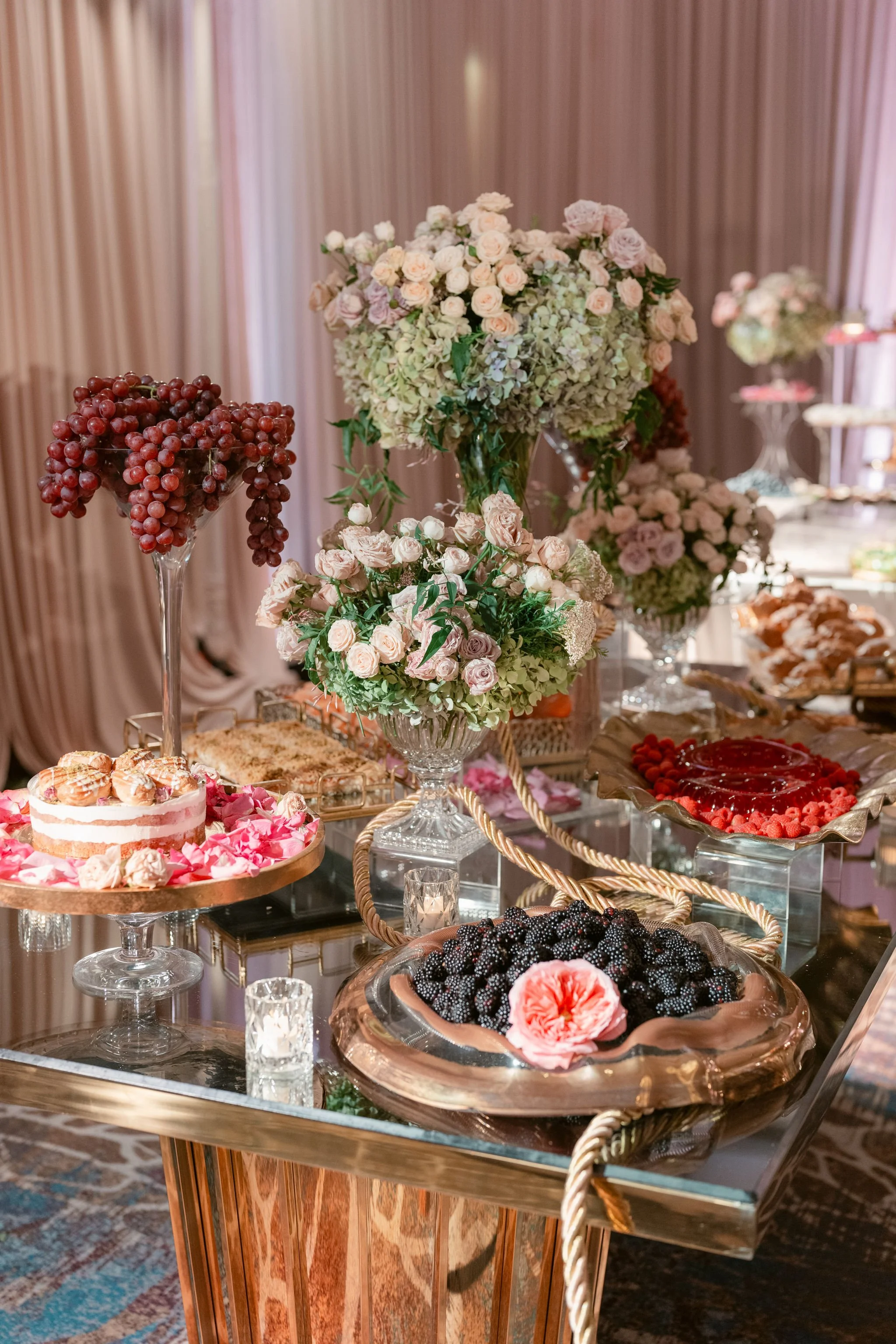 Dessert Table Styled and Coordinated by a Wedding Planner with Elegant Display Details