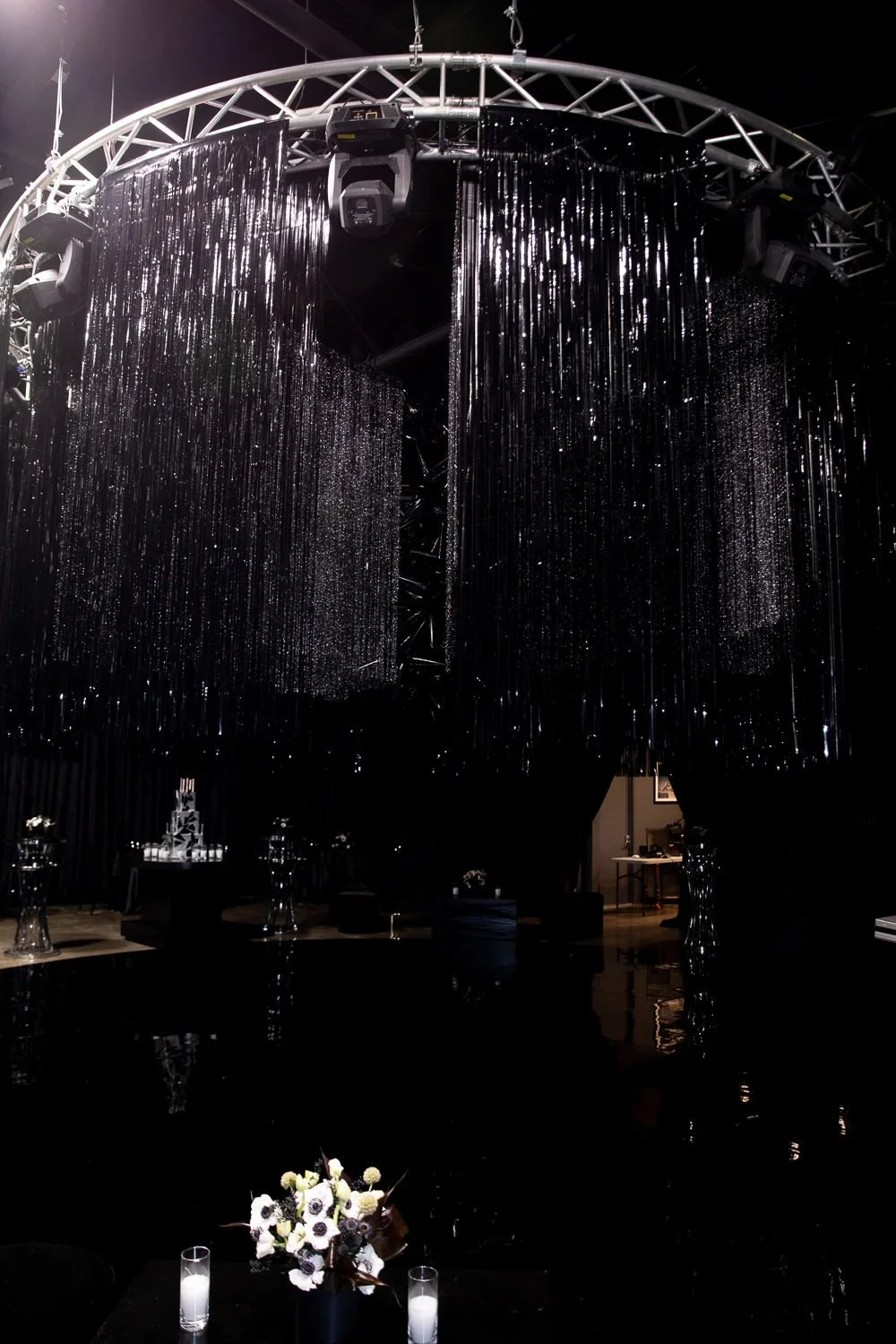 Event Planning Birthday Party Backdrop with Black Shimmer Curtains and Dramatic Event Styling by an Event Planner Los Angeles