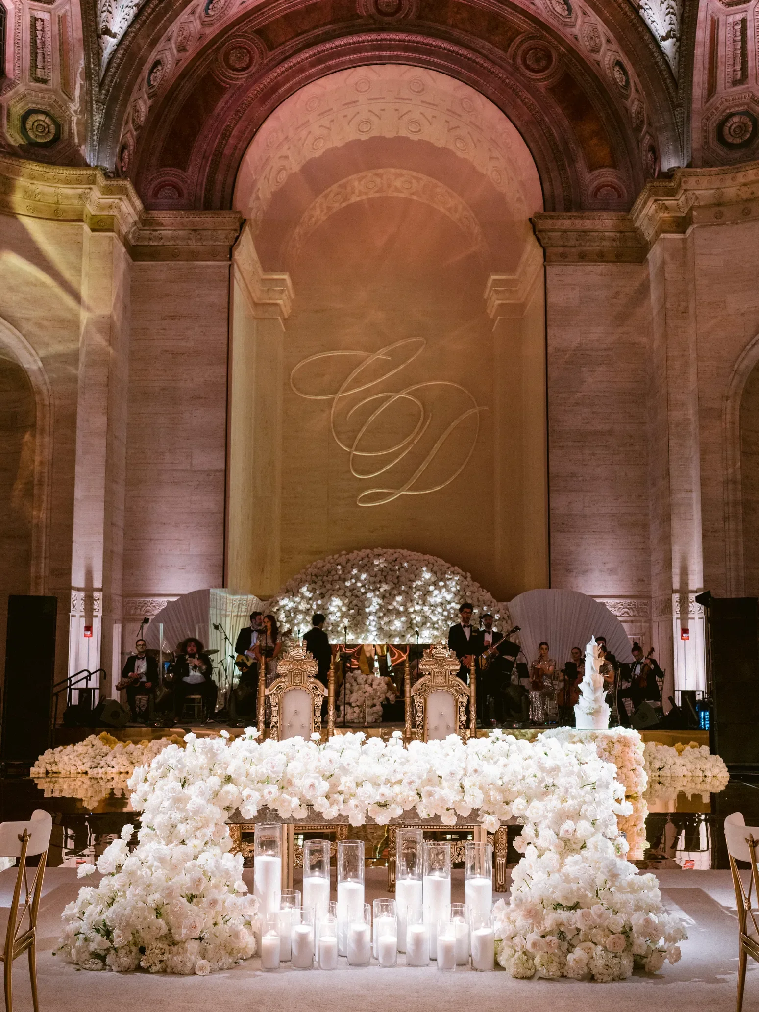 eddie-zaratsian-cathedral-monogram-white-floral-runner-wedding-reception.webp