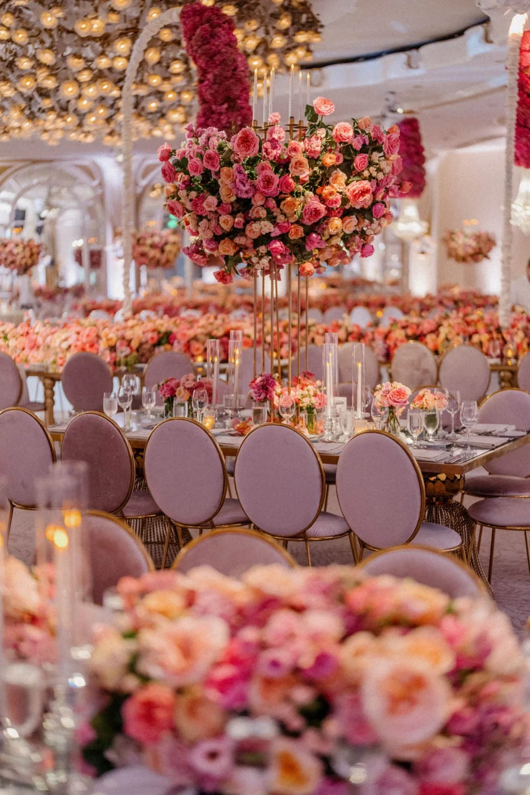 Colorful Wedding Design with Pink and Orange Decor in a Vibrant Reception Setting