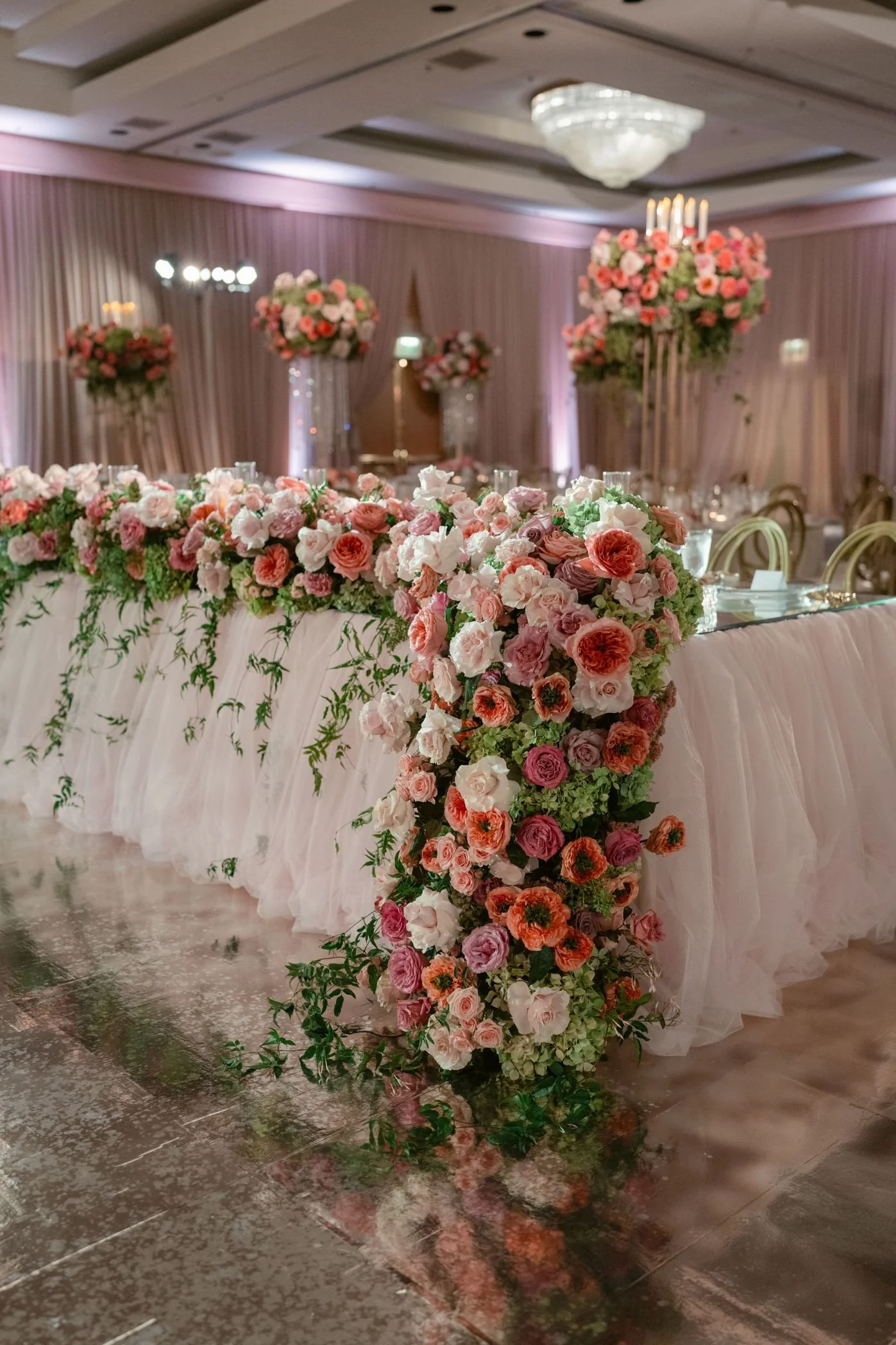 Wedding Planner Designing a Reception with Mirror Details and Ambient Lighting