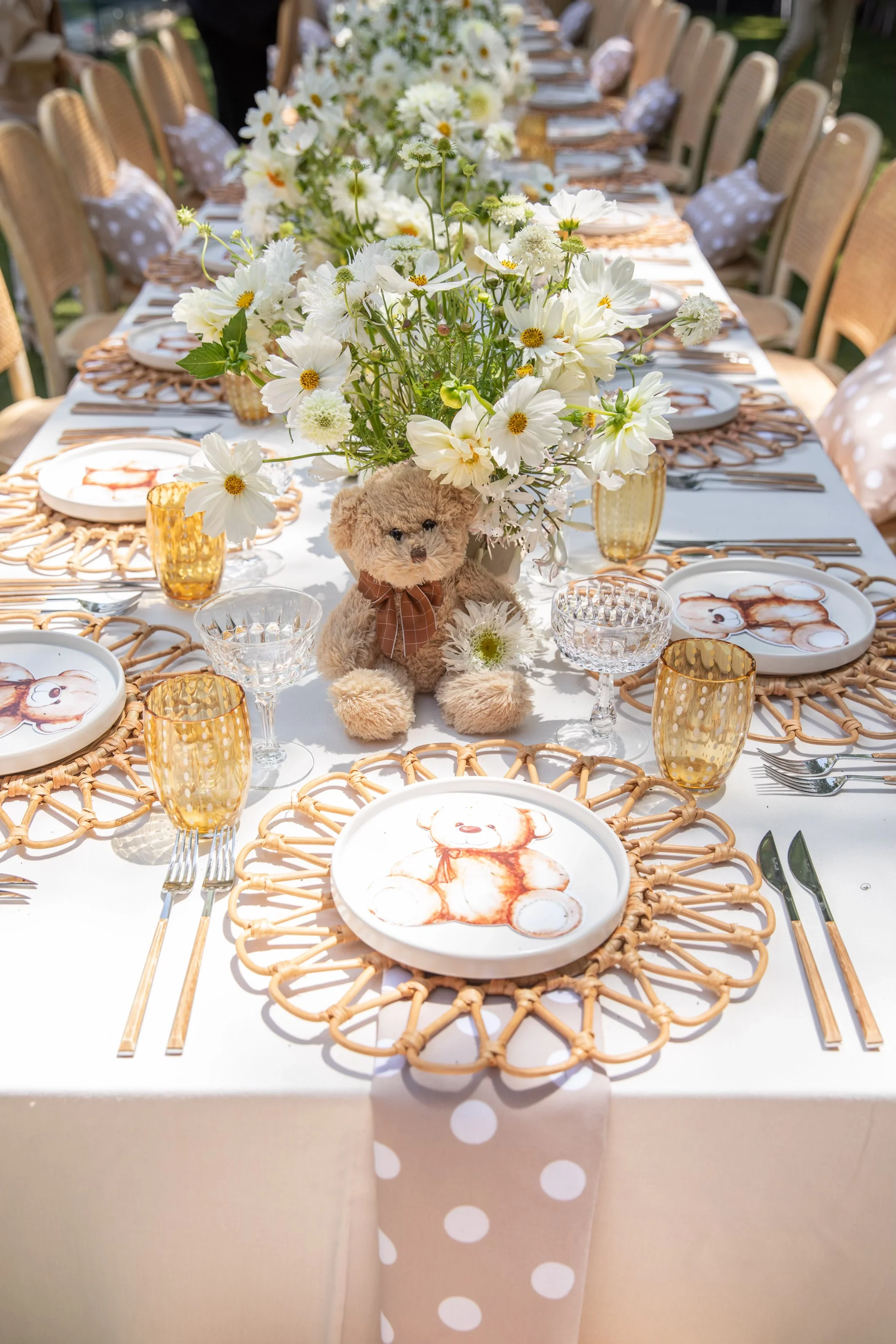 Teddy bear baby shower table decorations with custom teddy bear plates and spring floral centerpieces
