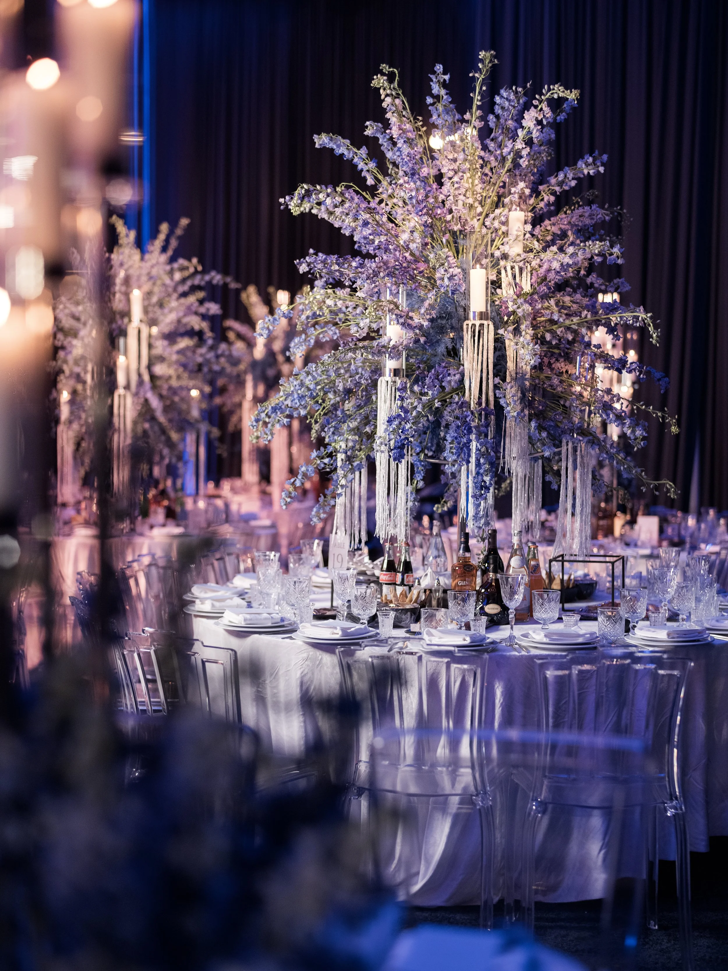 Wedding centerpiece design for a purple themed wedding