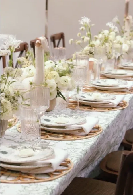 Luxury baby shower table design with layered place settings and garden-style florals