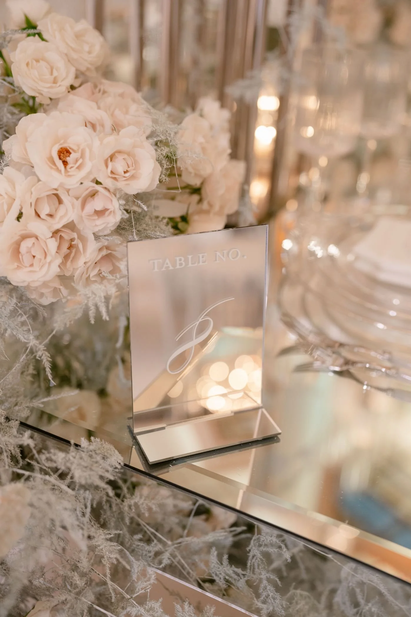 Wedding Planner and Event Design Featuring an Elegant Tablescape with Layered Floral Details