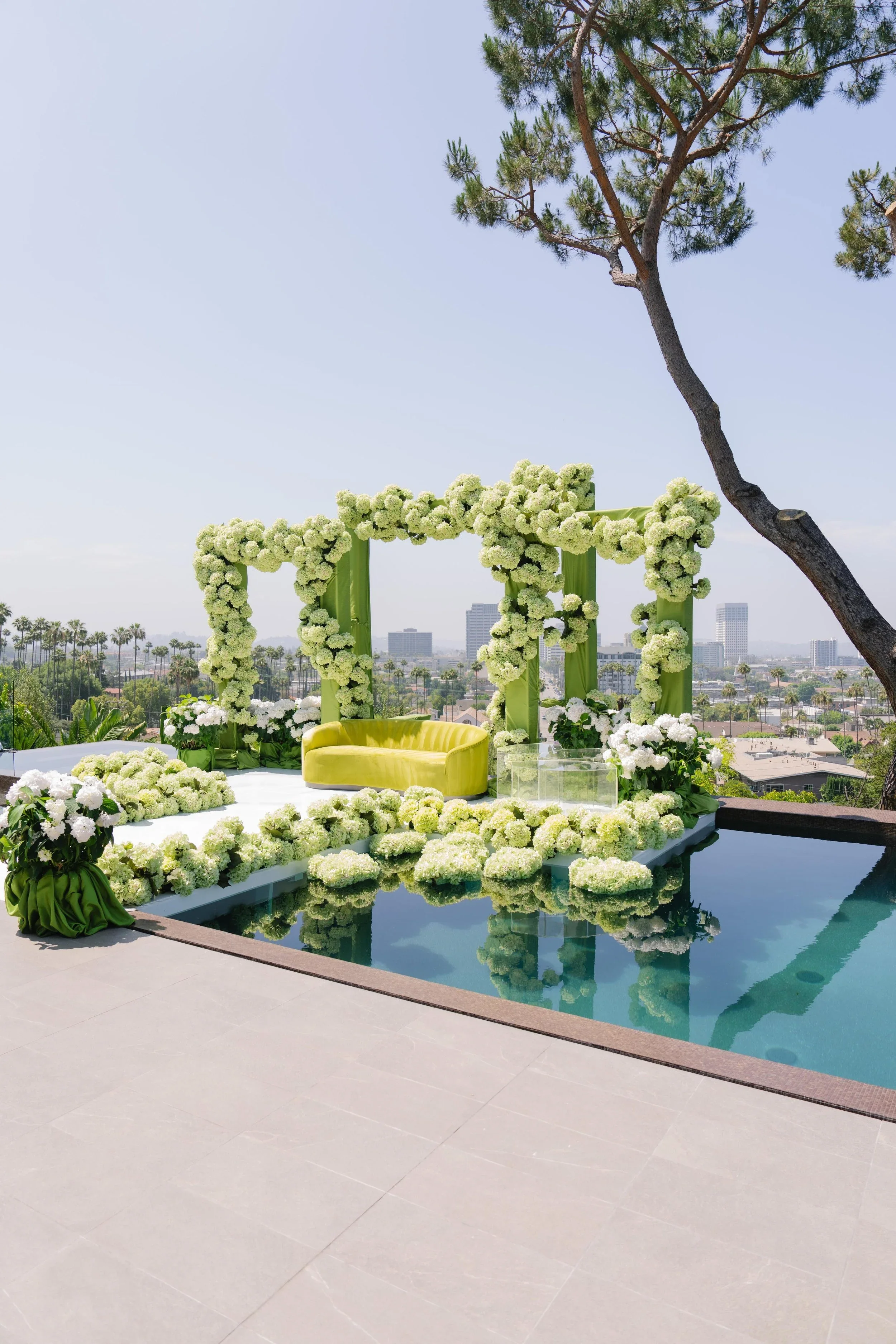 Luxury Event Planner Los Angeles Designing a Poolside Outdoor Event with Greenery and Refined Decor