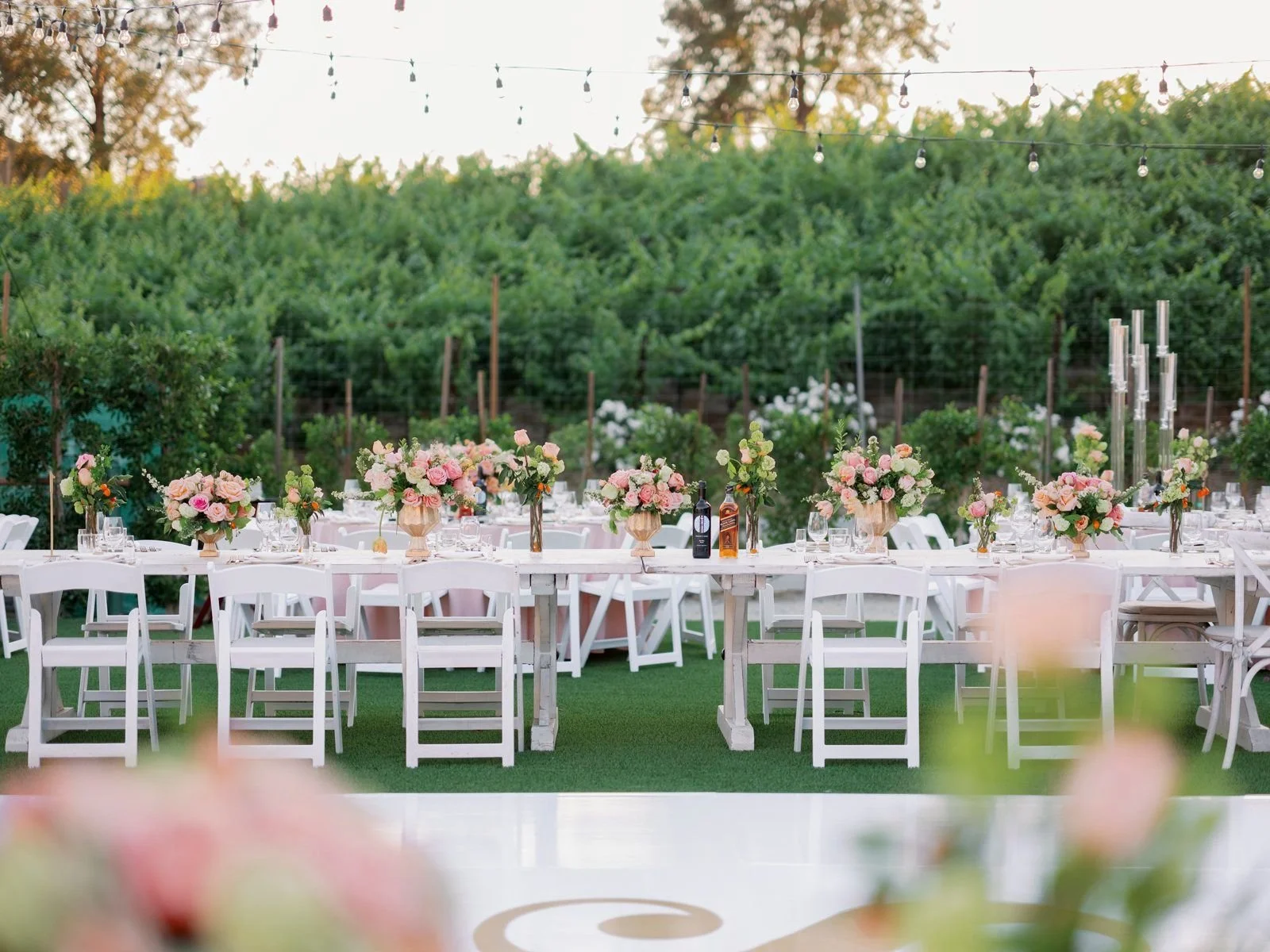 Outdoor Wedding Ceremony in Los Angeles Surrounded by Natural Greenery and Soft Florals
