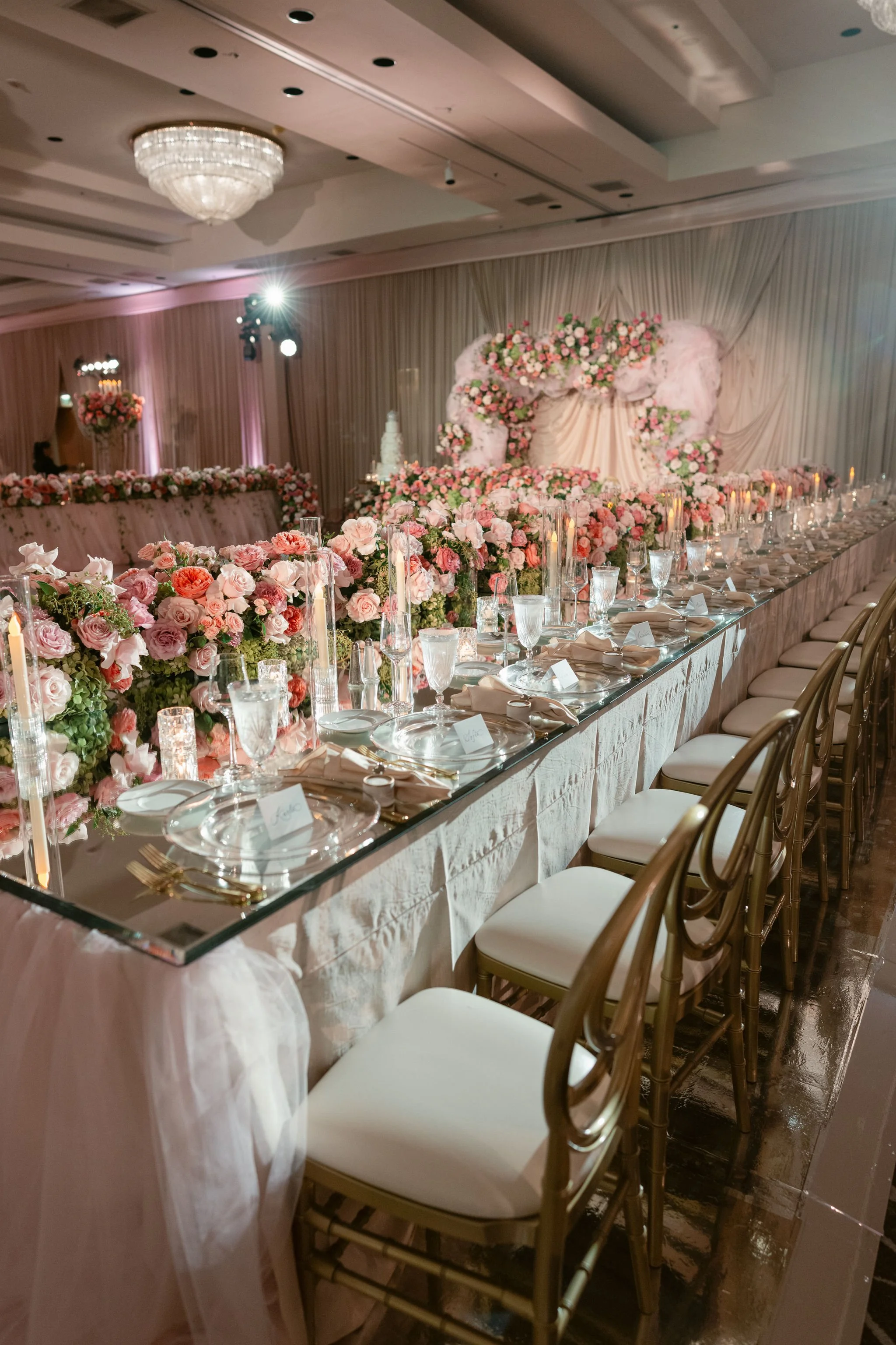 Wedding Planner Designing a Reception with Mirror Details and Ambient Lighting
